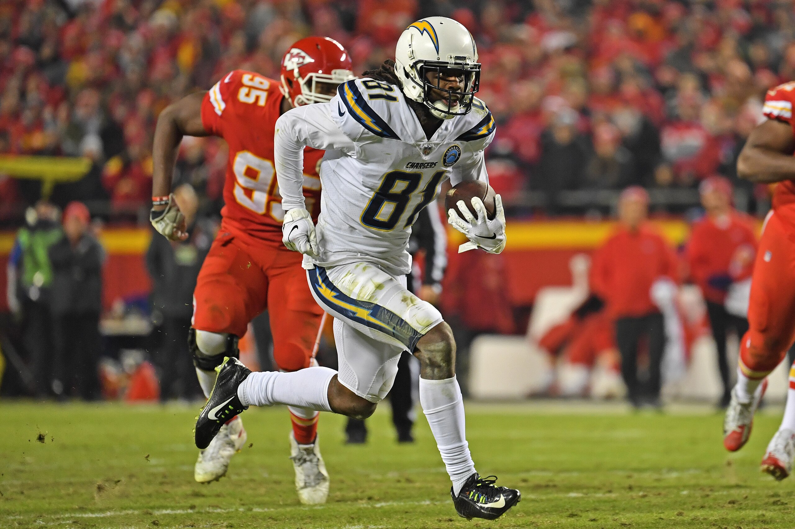 KANSAS CITY, MO - DECEMBER 13:  Wide receiver Mike Williams #81 of the Los Angeles Chargers rushes up field for a touchdown during the second half against the Kansas City Chiefs on December 13, 2018 at Arrowhead Stadium in Kansas City, Missouri.  (Photo b