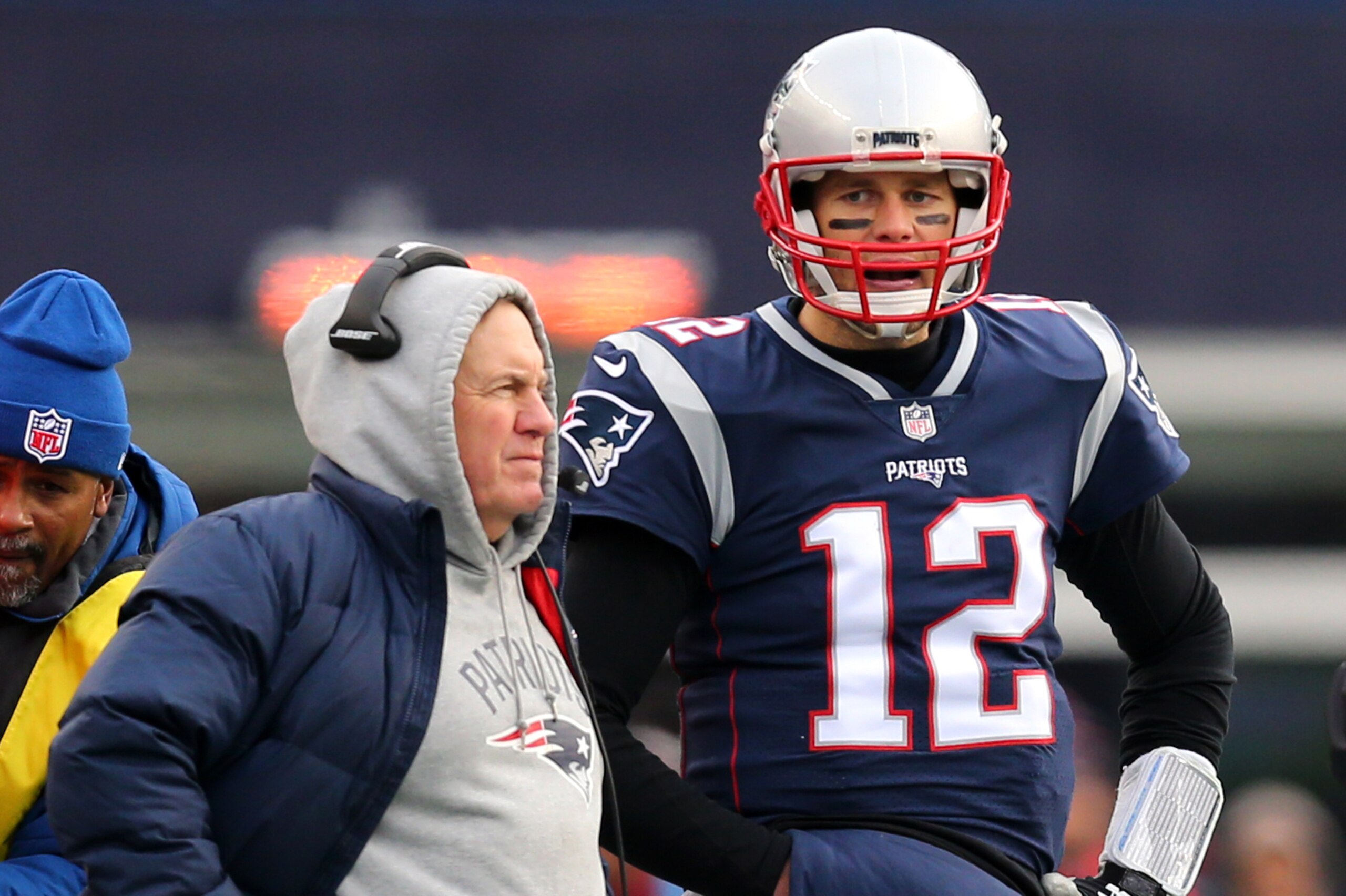 FOXBORO, MA - DECEMBER 24: Head coach Bill Belichick of the New England Patriots stands with Tom Brady #12 during the second half against the Buffalo Bills at Gillette Stadium on December 24, 2017 in Foxboro, Massachusetts. (Photo by Maddie Meyer/Getty Im