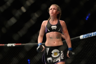 MEXICO CITY, MEXICO - NOVEMBER 15:  Leslie Smith walks to her corner after her fight against Jessic Eye was called due to her ear being damaged in their women's bantamweight bout during the UFC 180 event at Arena Ciudad de Mexico on November 15, 2014 in M