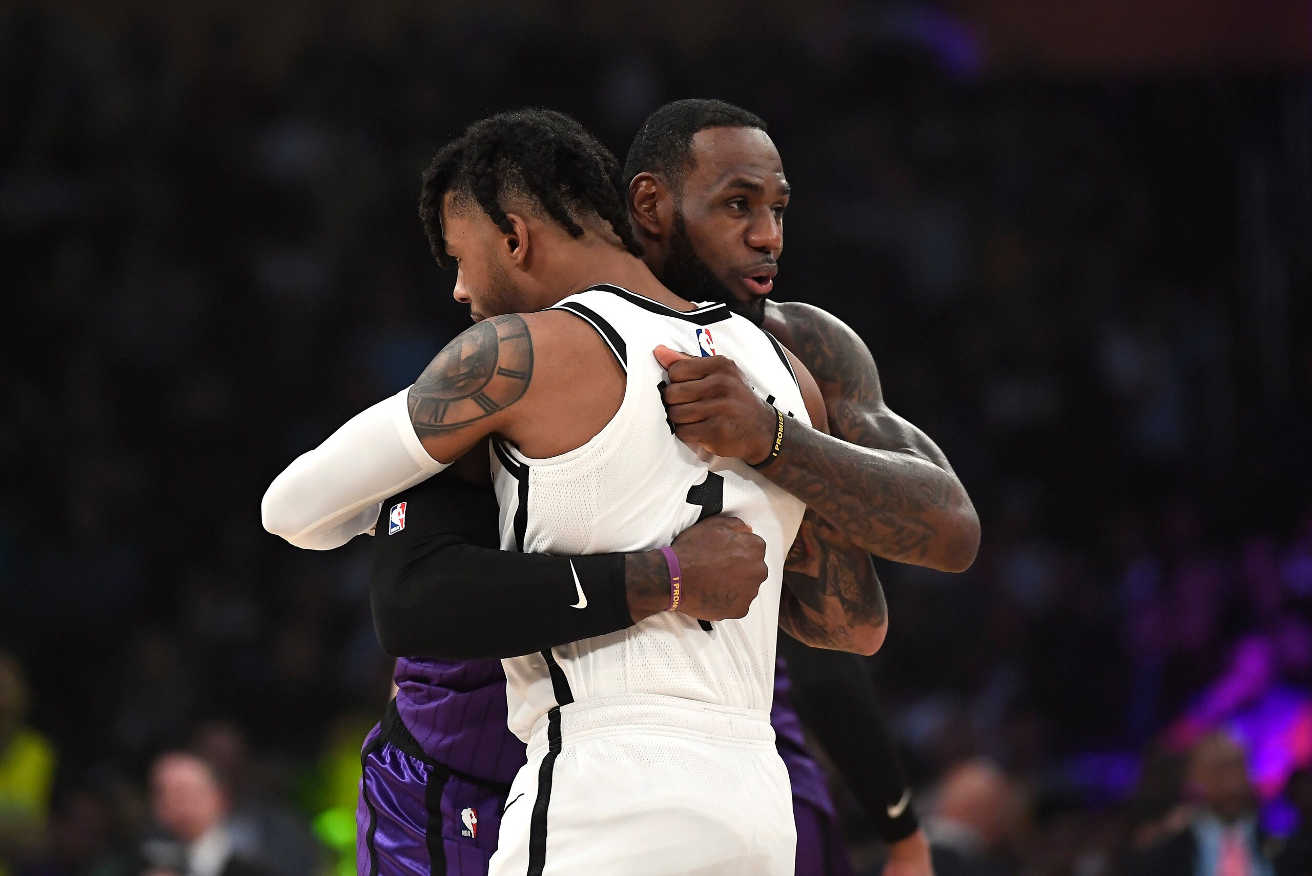 LOS ANGELES, CA - MARCH 22: LeBron James #23 of the Los Angeles Lakers greets D'Angelo Russell #1 of the Brooklyn Nets before the start of their NBA basketball game at Staples Center on March 22, 2019 in Los Angeles, California. NOTE TO USER: User express