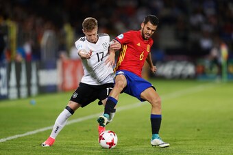 KRAKOW, POLAND - JUNE 30: Mitchell Weiser of Germany and Dani Ceballos of Spain competes for the ball during the UEFA U21 Final match between Germany and Spain at Krakow Stadium on June 30, 2017 in Krakow, Poland. (Photo by Nils Petter Nilsson/Ombrello/Ge
