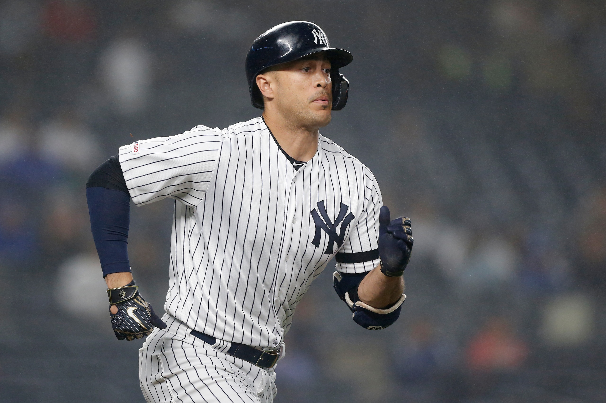 NEW YORK, NEW YORK - JUNE 18:   Giancarlo Stanton #27 of the New York Yankees in action against the Tampa Bay Rays at Yankee Stadium on June 18, 2019 in New York City. The Yankees defeated the Rays 6-3. (Photo by Jim McIsaac/Getty Images)