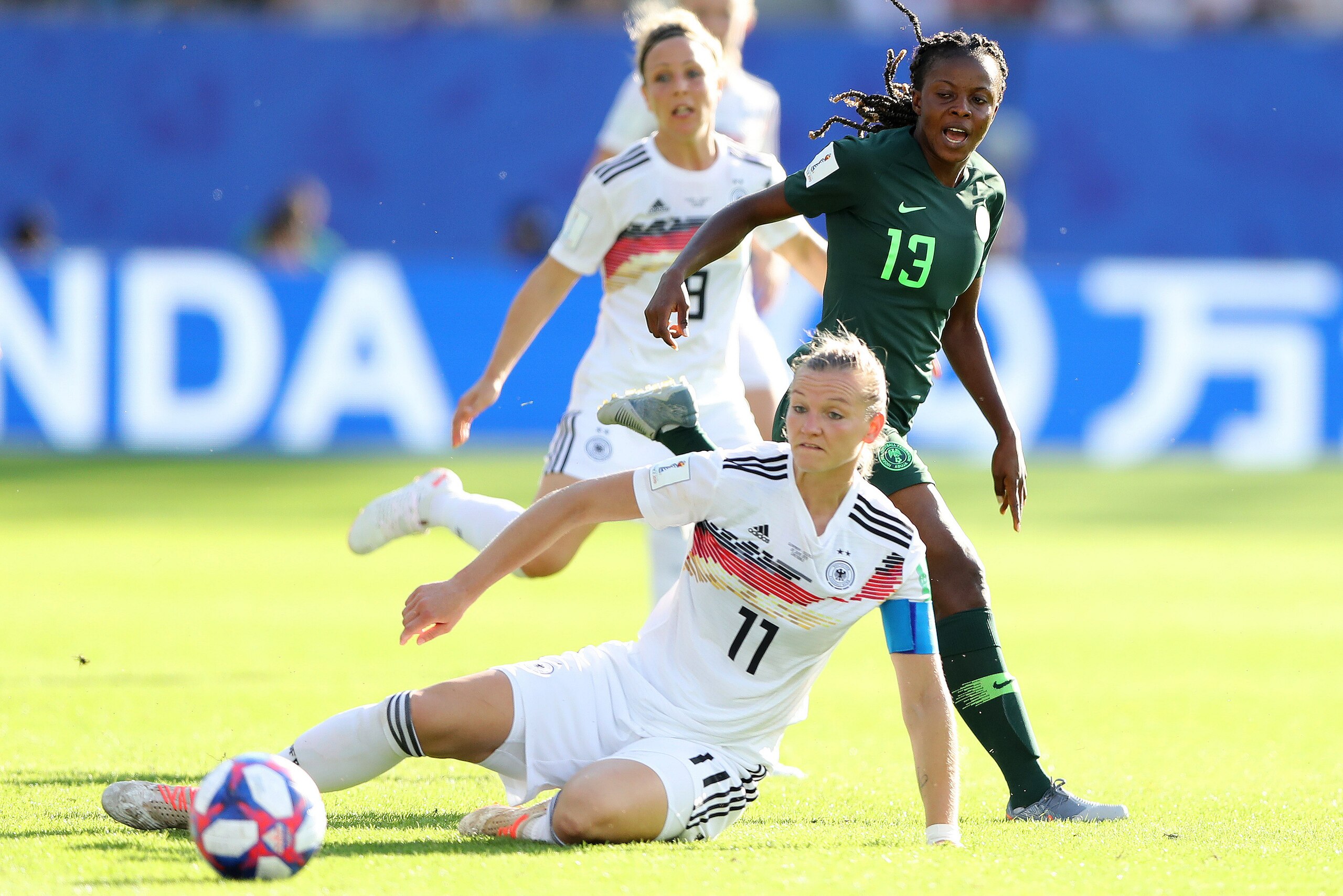 GRENOBLE, FRANCE - JUNE 22: Alexandra Popp of Germany is challenged by Ngozi Okobi of Nigeria during the 2019 FIFA Women's World Cup France Round Of 16 match between Germany and Nigeria at Stade des Alpes on June 22, 2019 in Grenoble, France. (Photo by El