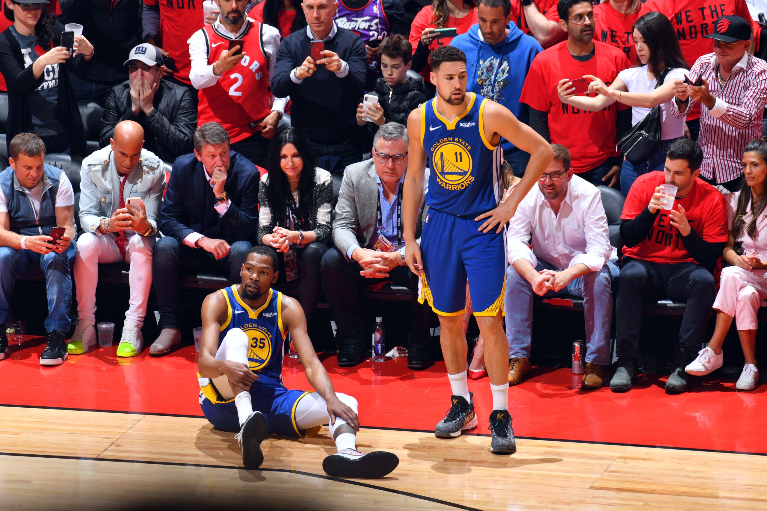 TORONTO, CANADA - JUNE 10: Kevin Durant #35 of the Golden State Warriors reacts to his leg injury during a game against the Toronto Raptors during Game Five of the NBA Finals on June 10, 2019 at Scotiabank Arena in Toronto, Ontario, Canada. NOTE TO USER: 
