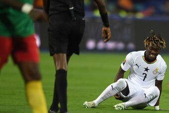 Ghana's midfielder Christian Atsu reacts as he sits on the pitch during the 2019 Africa Cup of Nations (CAN) Group F football match between Cameroon and Ghana at the Ismailia Stadium on June 29, 2019. (Photo by OZAN KOSE / AFP)        (Photo credit should