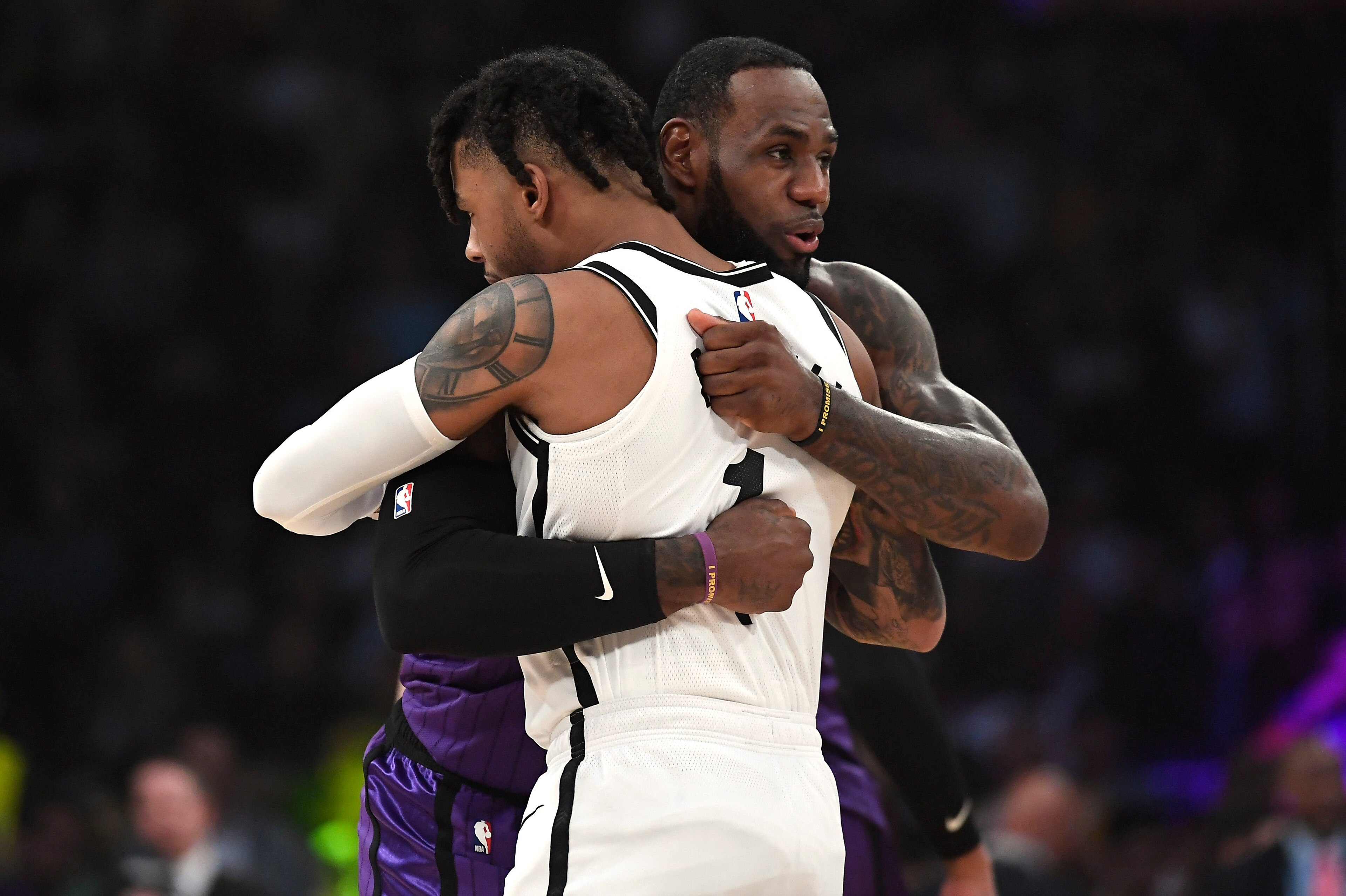 LOS ANGELES, CA - MARCH 22: LeBron James #23 of the Los Angeles Lakers greets D'Angelo Russell #1 of the Brooklyn Nets before the start of their NBA basketball game at Staples Center on March 22, 2019 in Los Angeles, California. NOTE TO USER: User express
