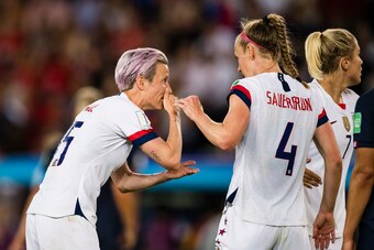 PARIS, FRANCE - JUNE 28: Megan Rapinoe of United States (L) talks to Becky Sauerbrunn of United States (R) during the 2019 FIFA Women's World Cup France Quarter Final match between France and USA at Parc des Princes on June 28, 2019 in Paris, France. (Pho