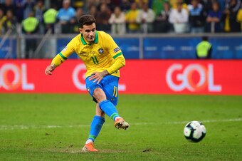 PORTO ALEGRE, BRAZIL - JUNE 27: Philippe Coutinho of Brazil scores during the penalty shoot-out following the Copa America Brazil 2019 quarterfinal match between Brazil and Paraguay at Arena do Gremio on June 27, 2019 in Porto Alegre, Brazil. (Photo by Ch