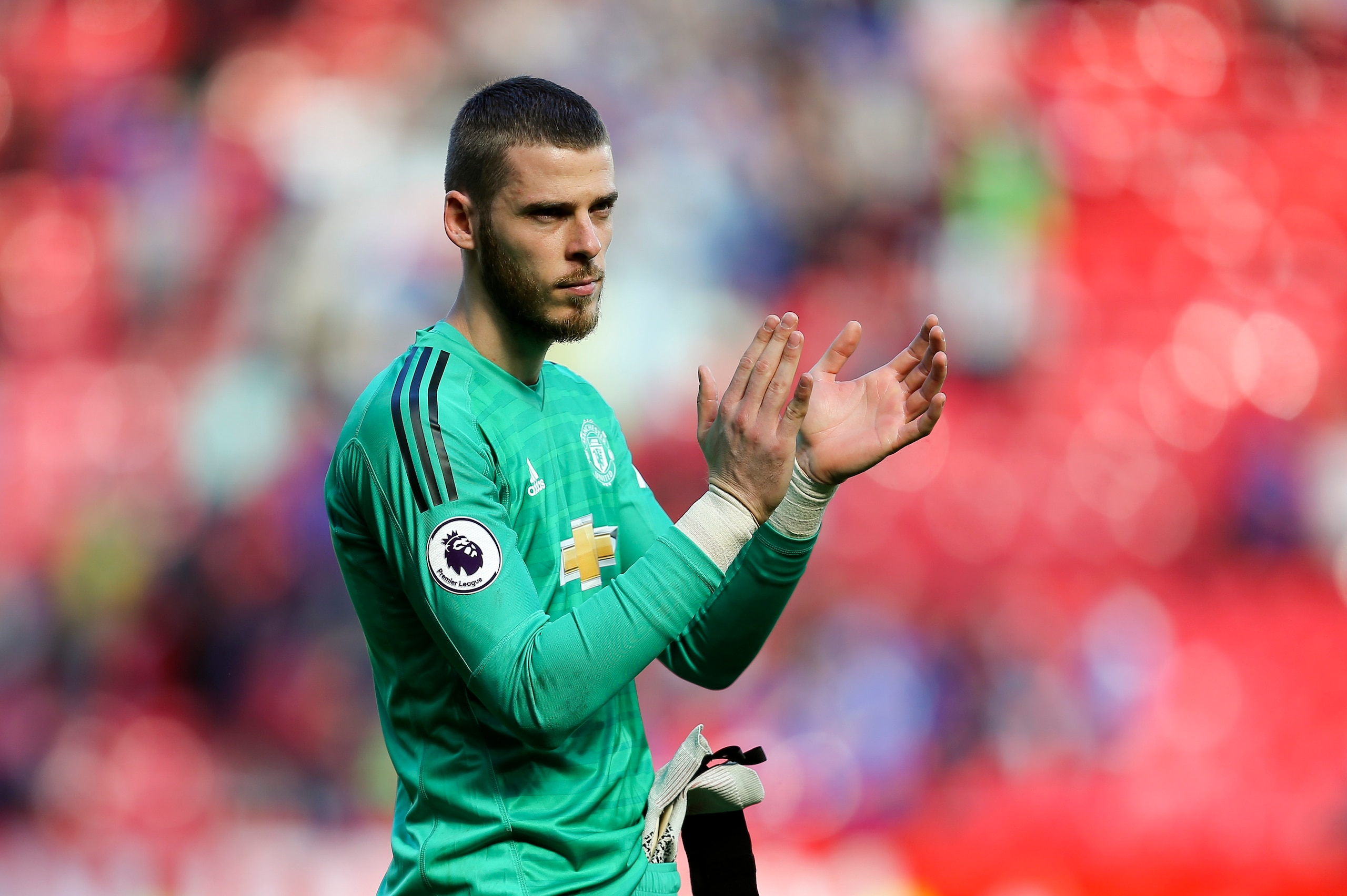 MANCHESTER, ENGLAND - MAY 12: David de Gea of Manchester United waves to the supporters after the Premier League match between Manchester United and Cardiff City at Old Trafford on May 12, 2019 in Manchester, United Kingdom. (Photo by James Baylis - AMA/G