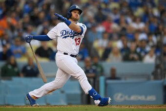 LOS ANGELES, CA - JUNE 22: Max Muncy #13 of the Los Angeles Dodgers grounds out while facing Bryan Shaw #29 of the Colorado Rockies in the eighth inning at Dodger Stadium on June 22, 2019 in Los Angeles, California. Dodgers won 5-4 in 11 innings. (Photo b