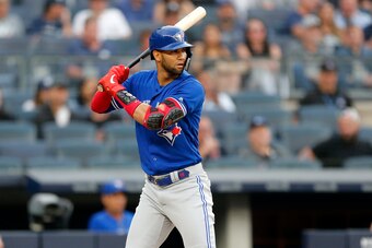 NEW YORK, NEW YORK - JUNE 25:   Lourdes Gurriel Jr. #13 of the Toronto Blue Jays in action against the New York Yankees at Yankee Stadium on June 25, 2019 in New York City.  The Yankees defeated the Blue Jays 4-3. (Photo by Jim McIsaac/Getty Images)