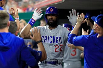 CINCINNATI, OHIO - JUNE 28:   Jason Heyward #22 of the Chicago Cubs celebrates with teammates after hitting a two run home run in the 7th inning against the Cincinnati Reds at Great American Ball Park on June 28, 2019 in Cincinnati, Ohio. (Photo by Andy L