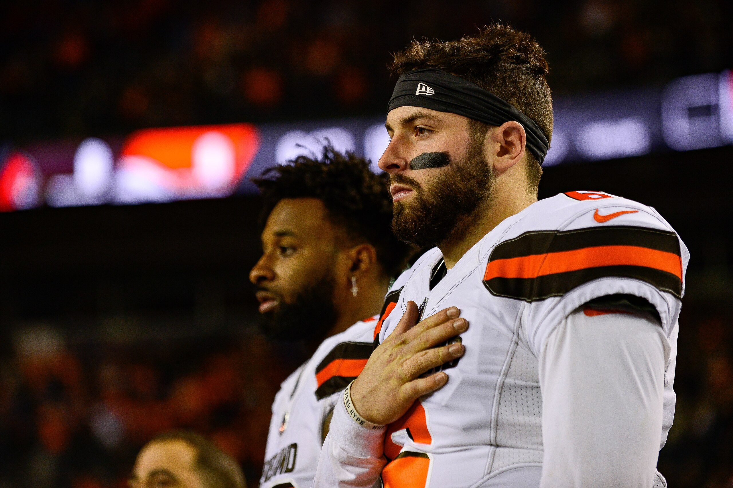 DENVER, CO - DECEMBER 15:  Quarterback Baker Mayfield #6 and wide receiver Jarvis Landry #80 of the Cleveland Browns stand on the field during the national anthem before a game against the Denver Broncos at Broncos Stadium at Mile High on December 15, 201