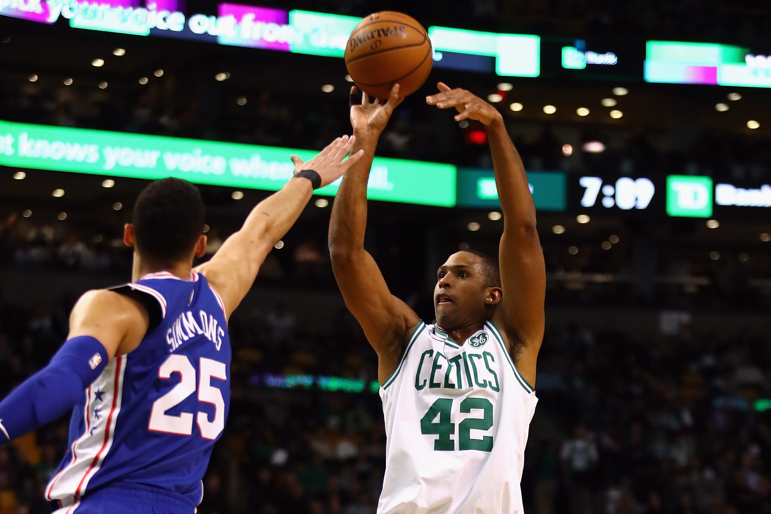 BOSTON, MA - JANUARY 18:  Al Horford #42 of the Boston Celtics shoots the ball during the first half against Ben Simmons #25 of the Philadelphia 76ers at TD Garden on January 18, 2018 in Boston, Massachusetts.  (Photo by Tim Bradbury/Getty Images)