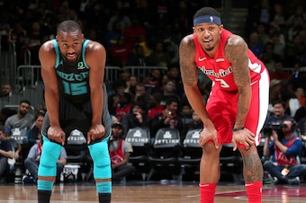 WASHINGTON, DC - DECEMBER 29: Kemba Walker #15 of the Charlotte Hornets and Bradley Beal #3 of the Washington Wizards look on during the game on December 29, 2018 at Capital One Arena in Washington, DC. NOTE TO USER: User expressly acknowledges and agrees
