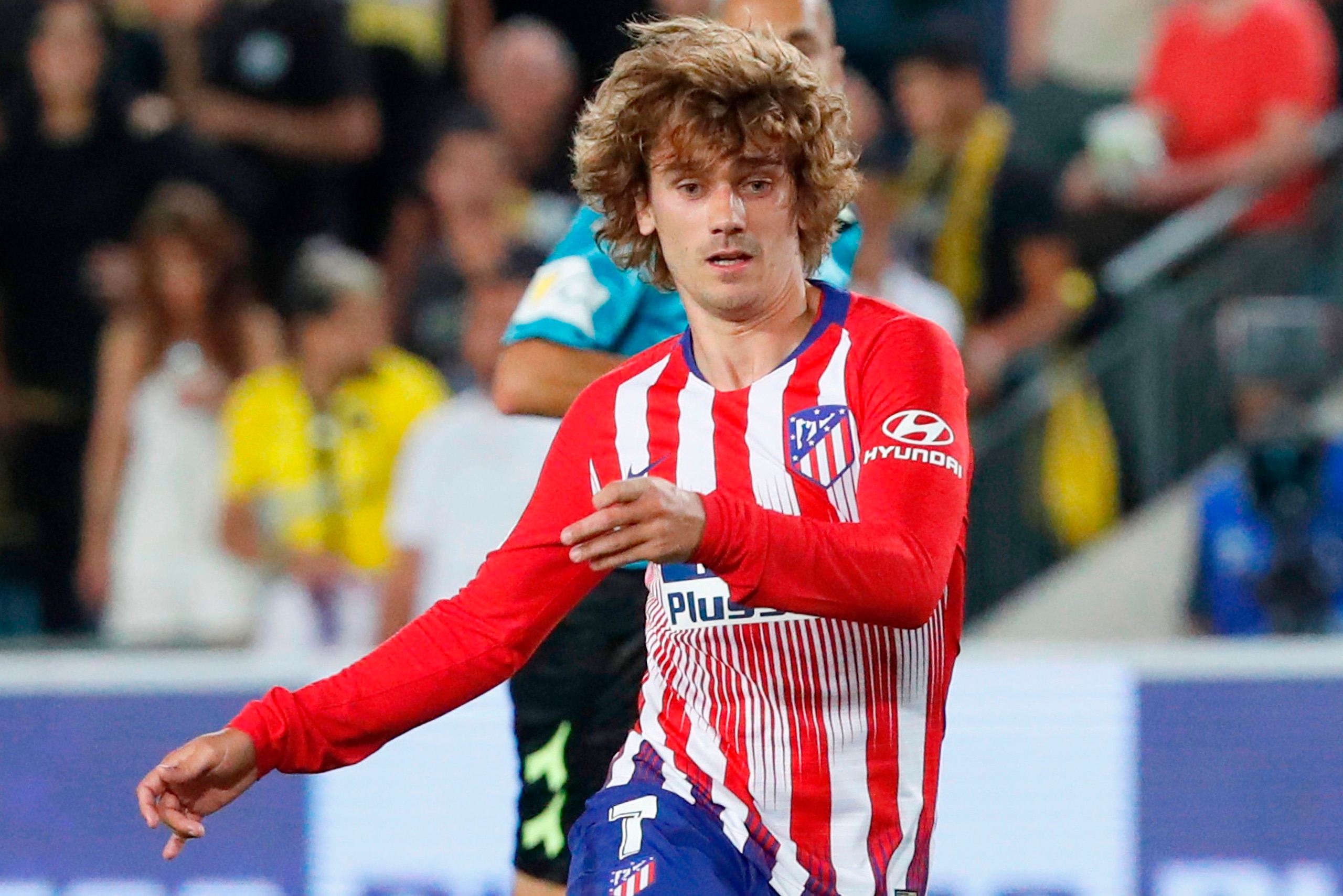 Atletico Madrid's French forward Antoine Griezmann takes a shot during the friendly football match between Beitar Jerusalem and Atletico Madrid at the Teddy Stadium in Jerusalem on May 21, 2019. (Photo by Jack GUEZ / AFP)        (Photo credit should read 