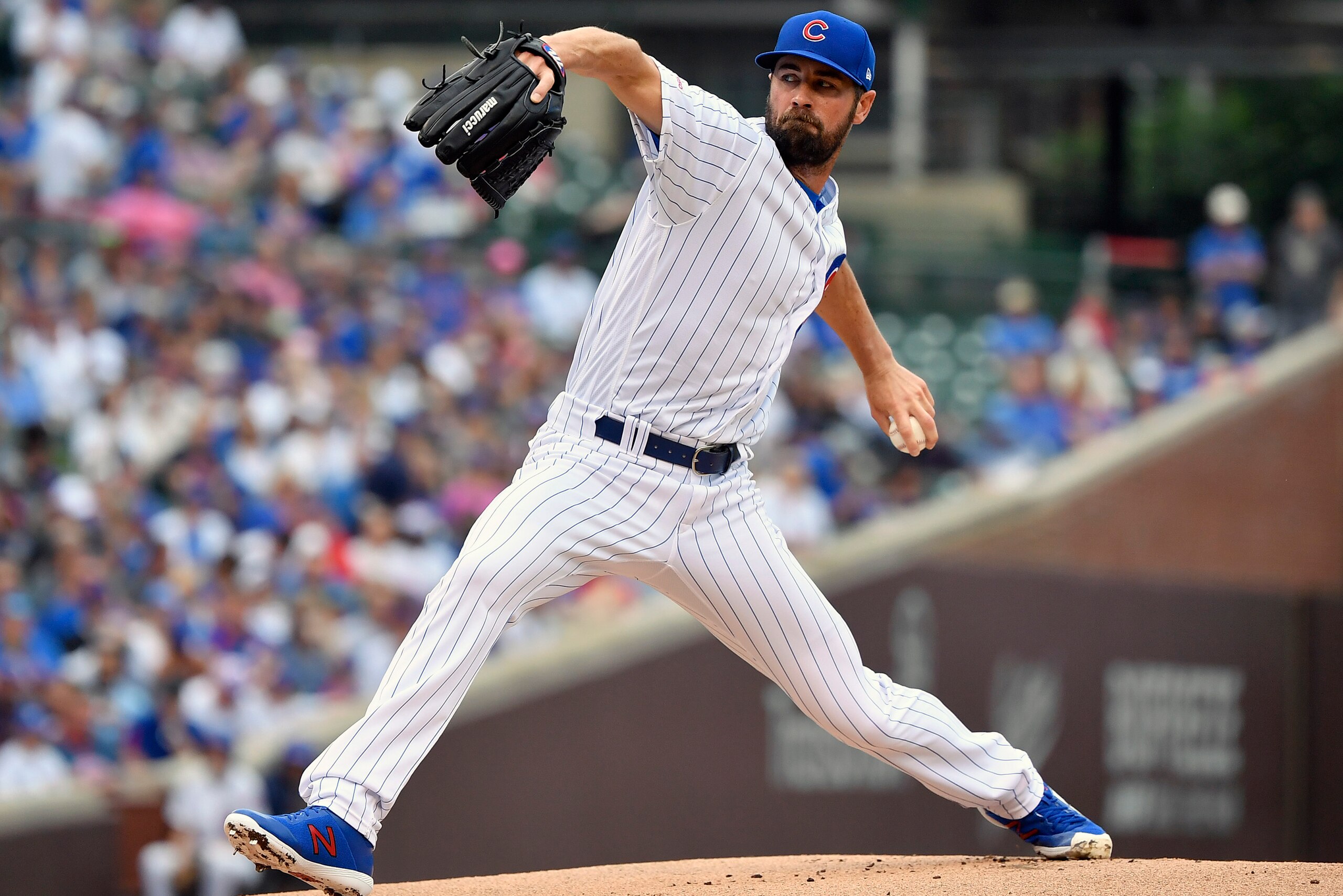 CHICAGO, ILLINOIS - JUNE 23: Cole Hamels #35 of the Chicago Cubs pitches the ball against the New York Mets at Wrigley Field on June 23, 2019 in Chicago, Illinois. (Photo by Quinn Harris/Getty Images)