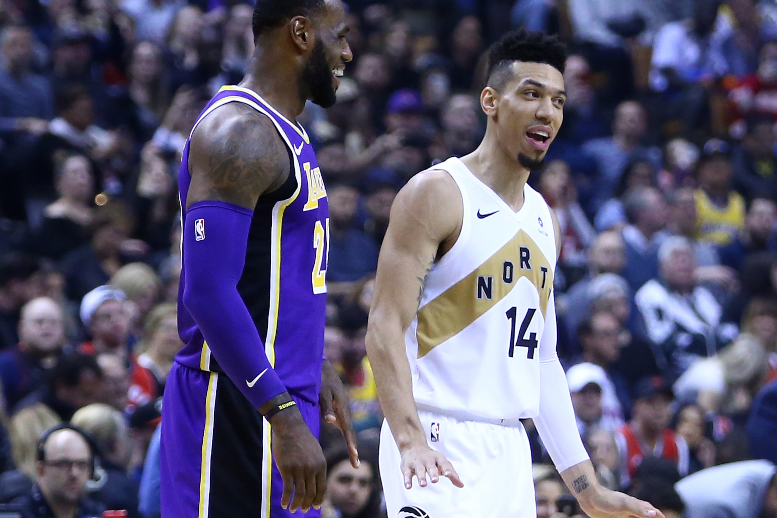 TORONTO, ON - MARCH 14:  LeBron James #23 of the Los Angeles Lakers laughs with Danny Green #14 of the Toronto Raptors prior to the opening tip off of an NBA game at Scotiabank Arena on March 14, 2019 in Toronto, Canada.  NOTE TO USER: User expressly ackn