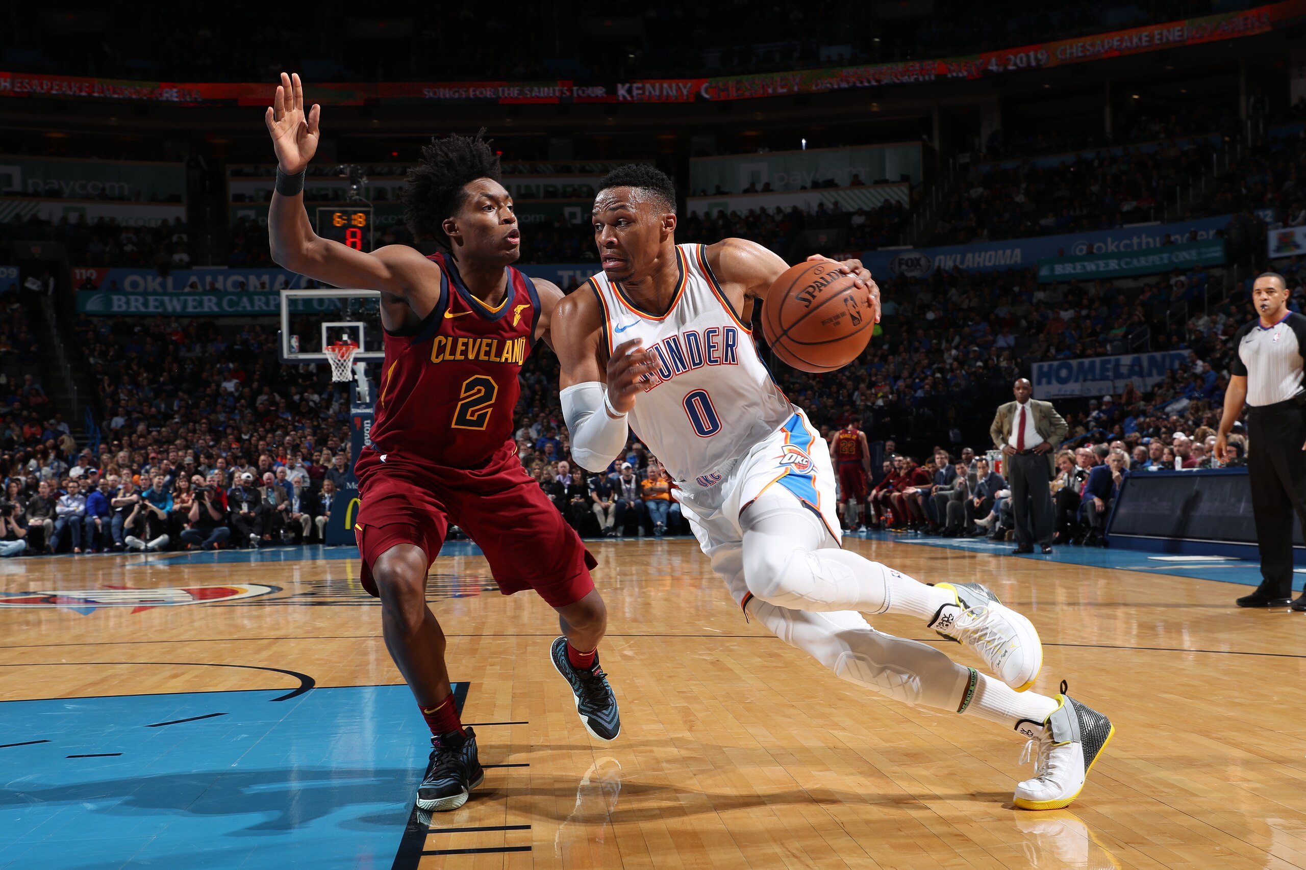 OKLAHOMA CITY, OK- NOVEMBER 28: Russell Westbrook #0 of the Oklahoma City Thunder handles the ball against Collin Sexton #2 of the Cleveland Cavaliers on November 28, 2018 at Chesapeake Energy Arena in Oklahoma City, Oklahoma. NOTE TO USER: User expressly