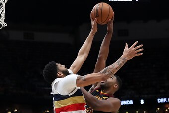 NEW ORLEANS, LOUISIANA - JANUARY 09:  Anthony Davis #23 of the New Orleans Pelicans blocks a shot by Tristan Thompson #13 of the Cleveland Cavaliers at Smoothie King Center on January 09, 2019 in New Orleans, Louisiana.  NOTE TO USER: User expressly ackno