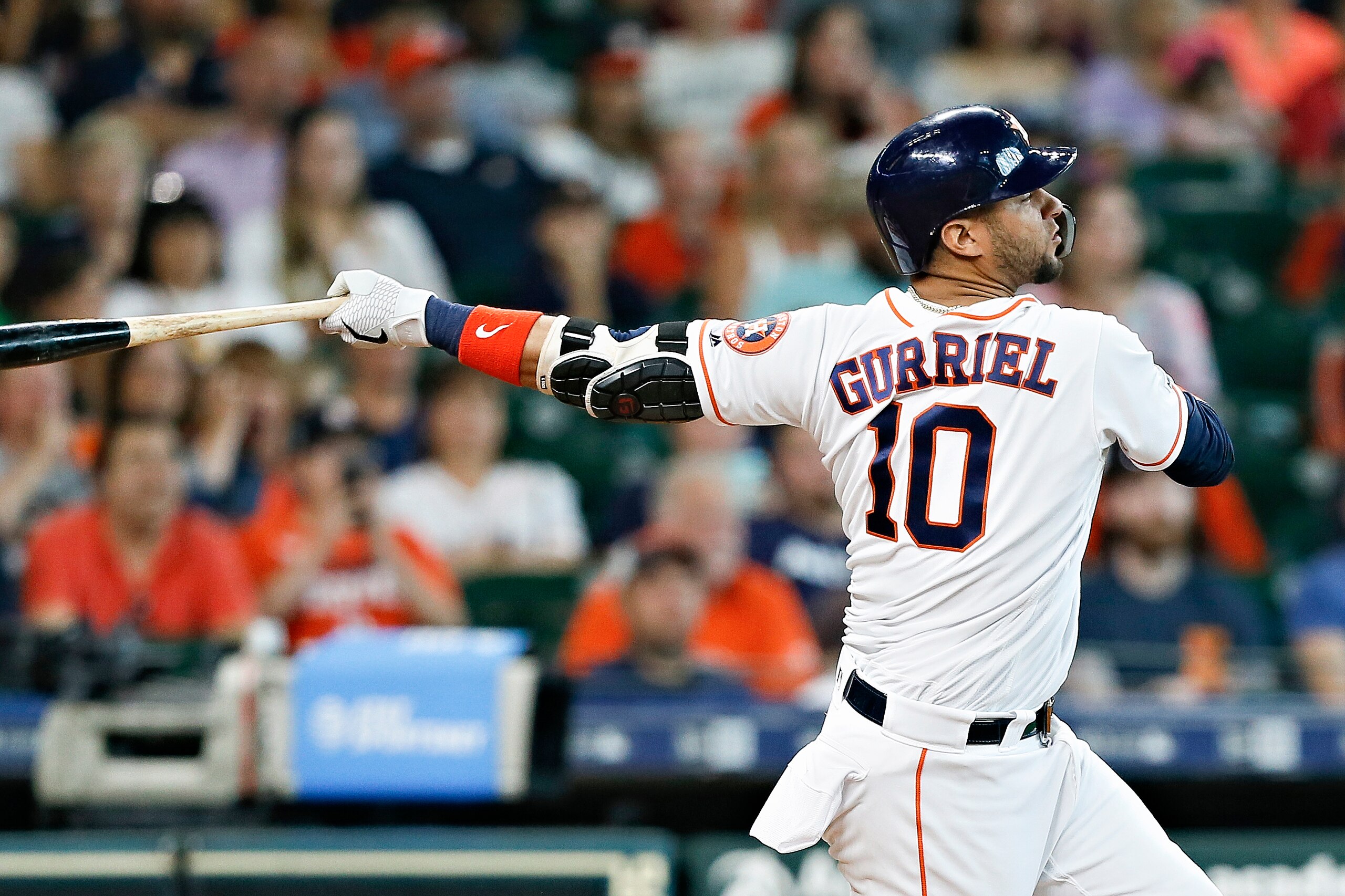 HOUSTON, TEXAS - JULY 07: Yuli Gurriel #10 of the Houston Astros hits a grand slam in the sixth inning against the Los Angeles Angels of Anaheim at Minute Maid Park on July 07, 2019 in Houston, Texas. (Photo by Bob Levey/Getty Images)