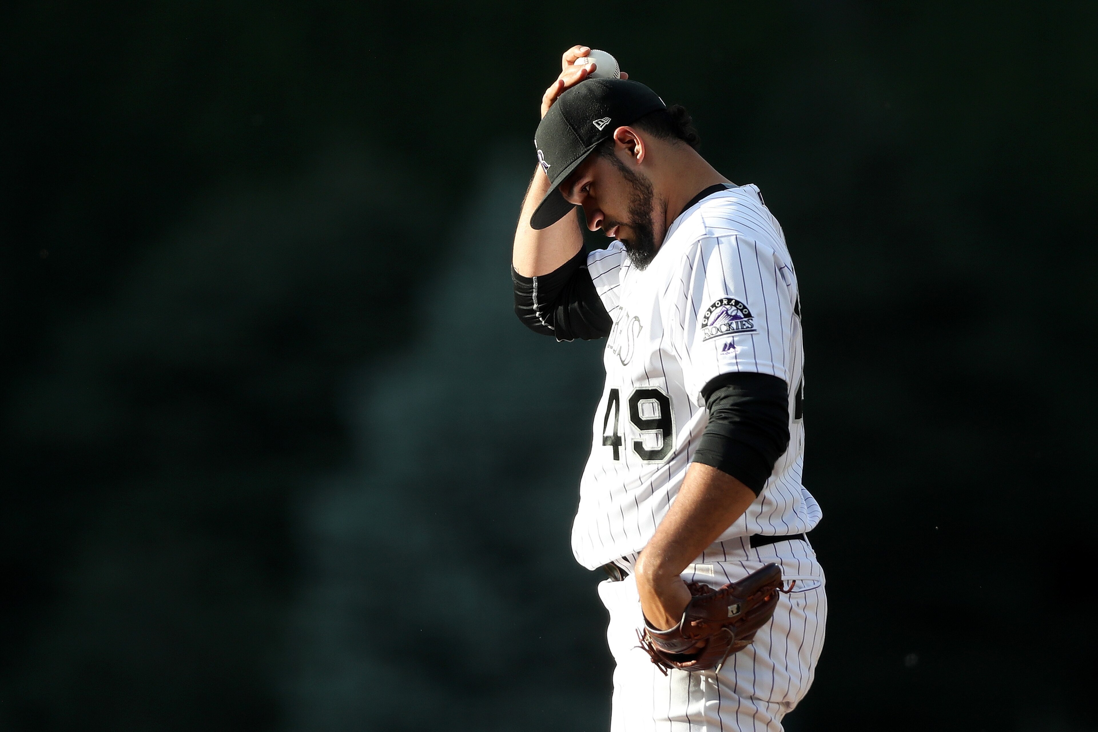 DENVER, COLORADO - JUNE 28: Starting pitcher Antonio Senzatela #49 of the Colorado Rockies throws in the first inning against the Los Angeles Dodgers at Coors Field on June 28, 2019 in Denver, Colorado. (Photo by Matthew Stockman/Getty Images) DENVER, COLORADO - JUNE 28: Starting pitcher Antonio Senzatela #49 of the Colorado Rockies throws in the first inning against the Los Angeles Dodgers at Coors Field on June 28, 2019 in Denver, Colorado. (Photo by Matthew Stockman/Getty Images)