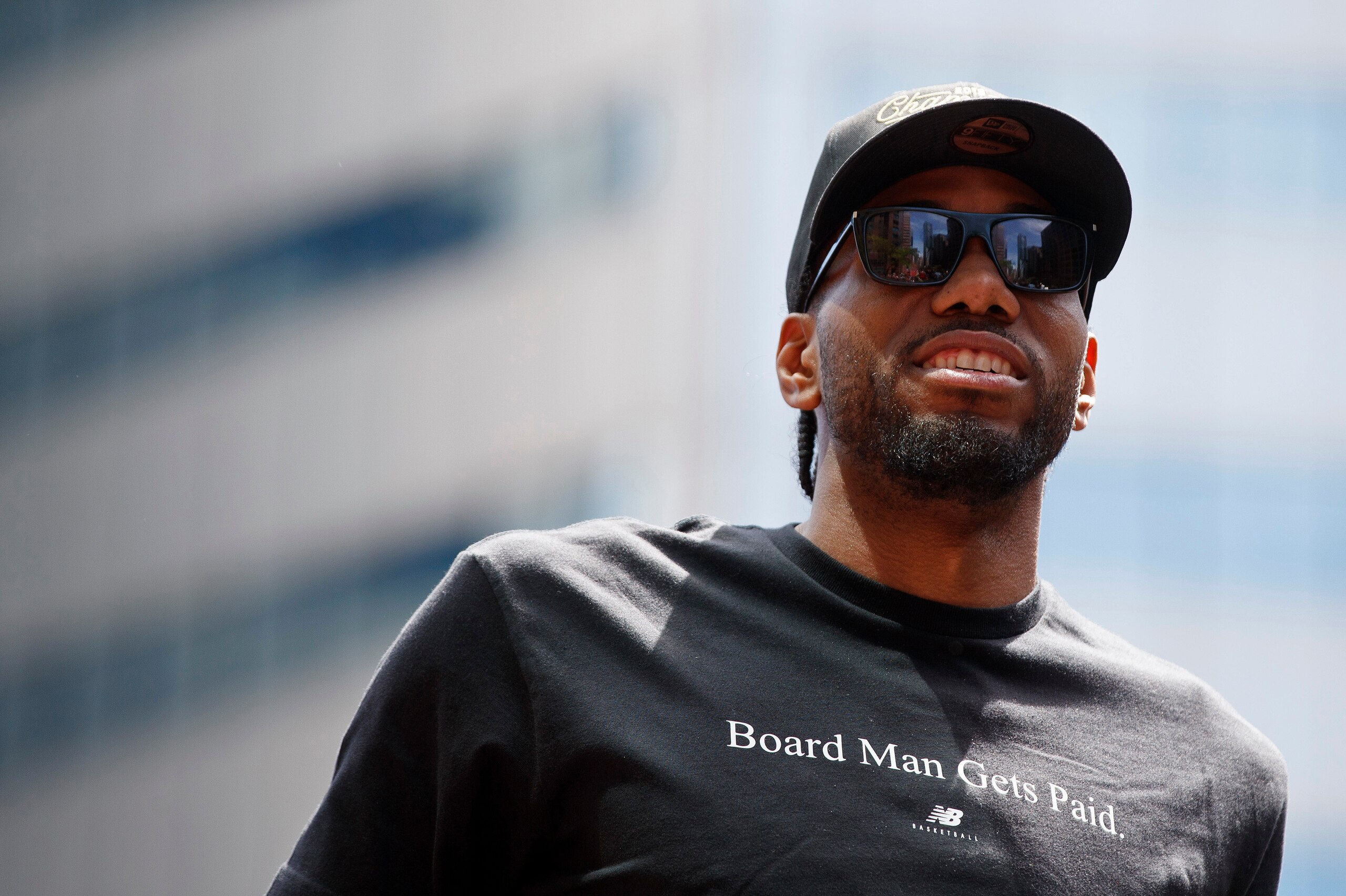 TORONTO, ON - JUNE 17: Kawhi Leonard #2 of the Toronto Raptors looks on from the team bus during the Toronto Raptors Championship Victory Parade on June 17, 2019 in Toronto, Ontario. NOTE TO USER: User expressly acknowledges and agrees that, by downloadi TORONTO, ON - JUNE 17: Kawhi Leonard #2 of the Toronto Raptors looks on from the team bus during the Toronto Raptors Championship Victory Parade on June 17, 2019 in Toronto, Ontario. NOTE TO USER: User expressly acknowledges and agrees that, by downloadi