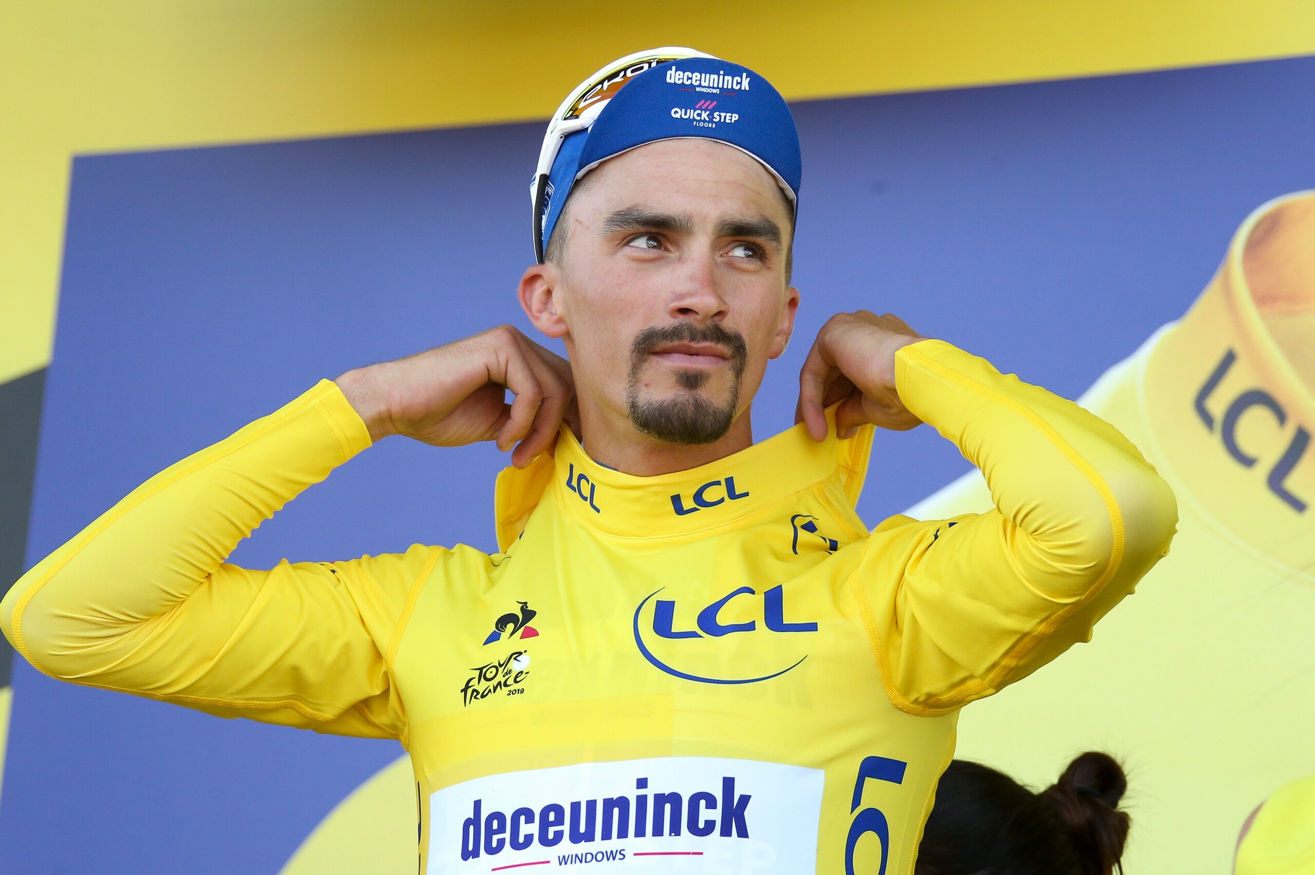 NANCY, FRANCE - JULY 9: Julian Alaphilippe of France and Deceuninck-Quick Step retains the yellow jersey of the race's leader during the podium ceremony following stage 4 of the 106th Tour de France 2019, a stage between Reims and Nancy (213,5km) on July 