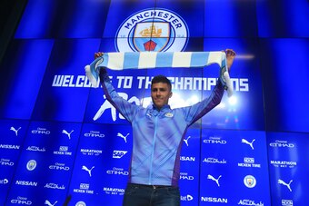 Manchester City's new signing Rodri displays his new colours during a press conference at the Etihad stadium in Manchester, northwest England on July 4, 2019. - Premier League champions Manchester City announced the signing of Spanish international midfie