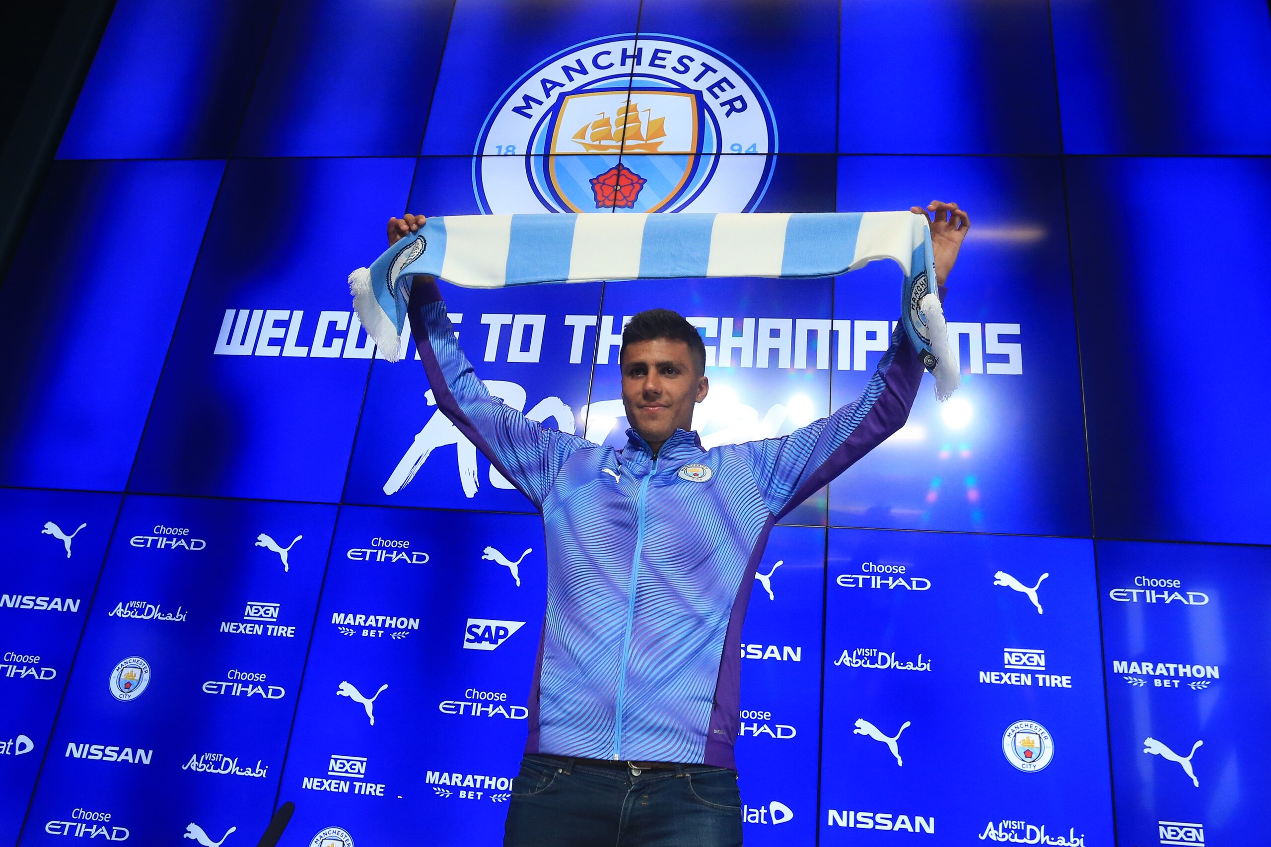 Manchester City's new signing Rodri displays his new colours during a press conference at the Etihad stadium in Manchester, northwest England on July 4, 2019. - Premier League champions Manchester City announced the signing of Spanish international midfie