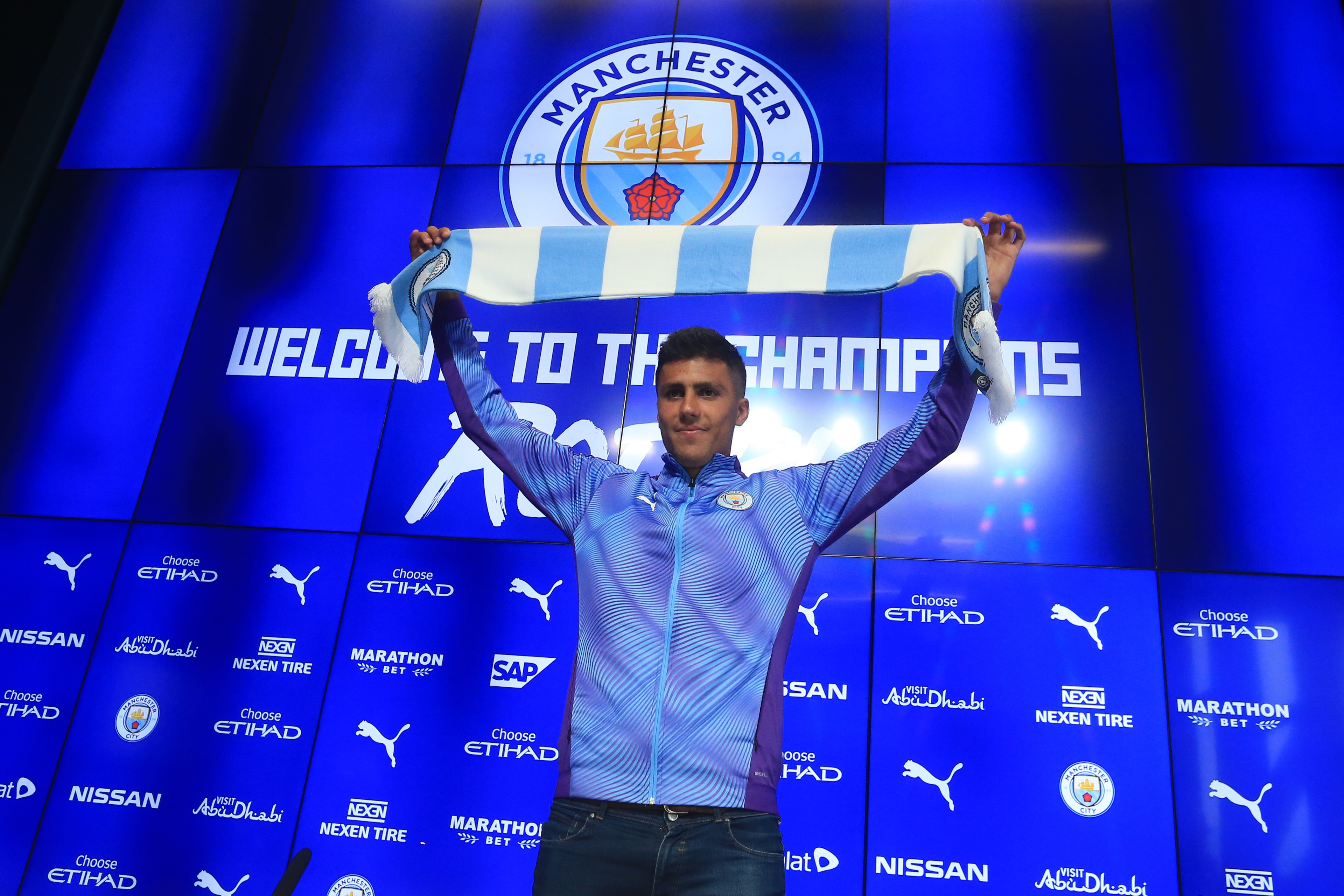 Manchester City's new signing Rodri displays his new colours during a press conference at the Etihad stadium in Manchester, northwest England on July 4, 2019. - Premier League champions Manchester City announced the signing of Spanish international midfie