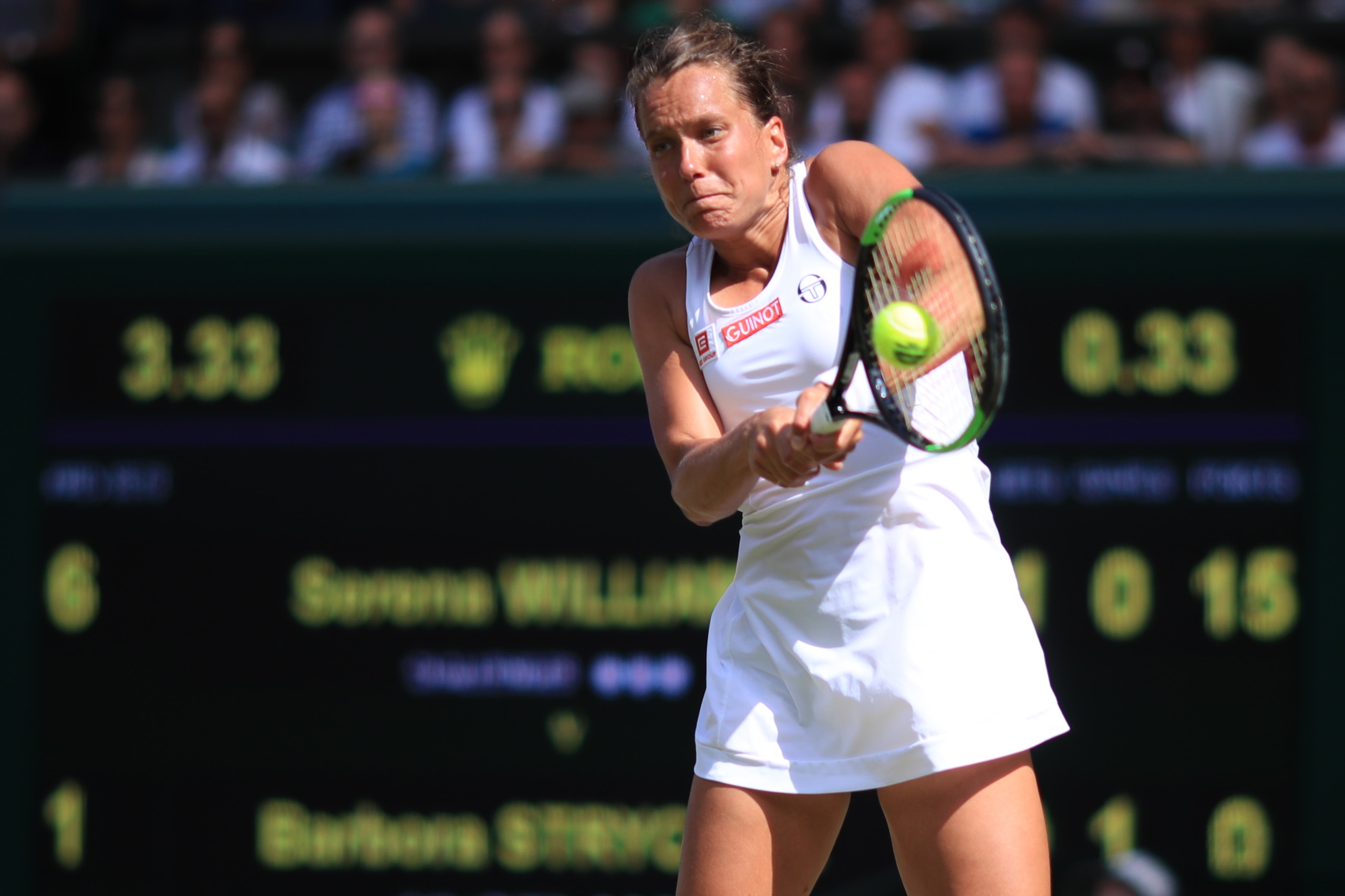 Czech Republic's Barbora Strycova returns against US player Serena Williams during their women's singles semi-final match on day ten of the 2019 Wimbledon Championships at The All England Lawn Tennis Club in Wimbledon, southwest London, on July 11, 2019. 