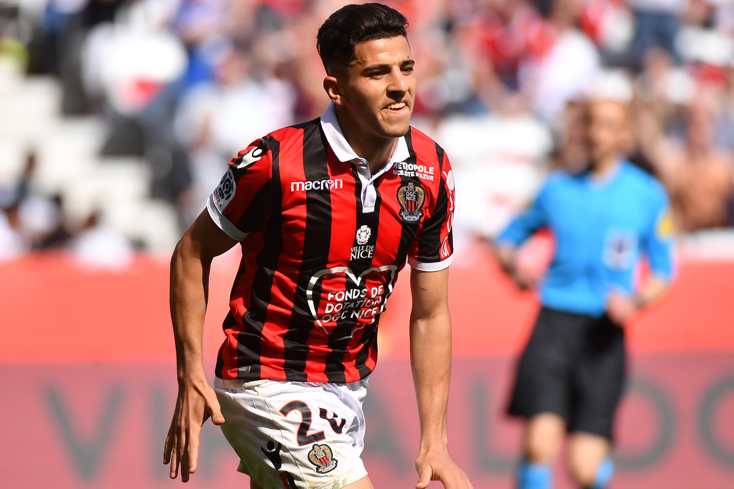 Nice's Algerian defender Youcef Atal celebrates after scoring his second goal during the French L1 football match between OGC Nice and En Avant Guingamp at the Allianz Riviera stadium in Nice, southern France on April 28, 2019. (Photo by YANN COATSALIOU /