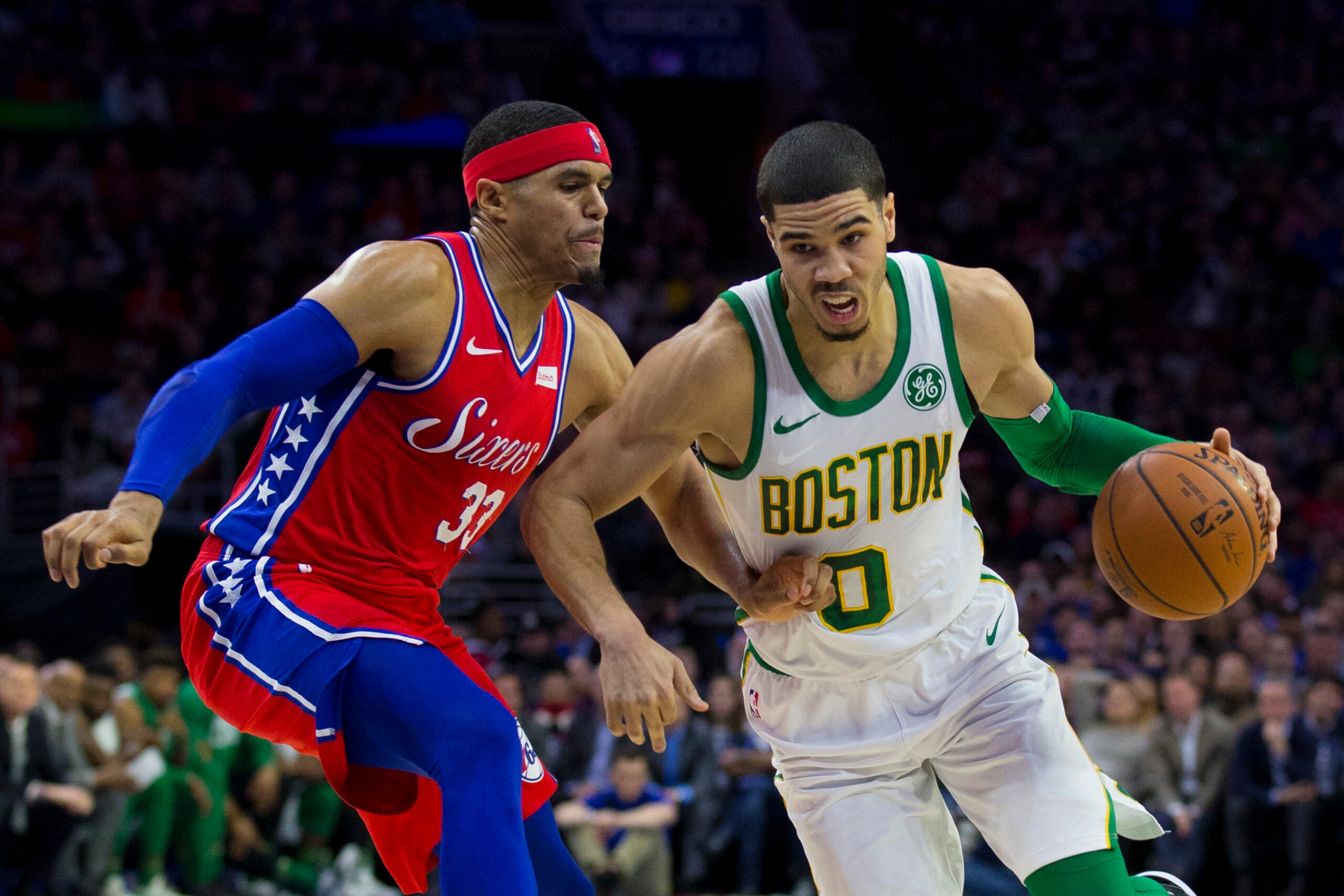 PHILADELPHIA, PA - FEBRUARY 12: Jayson Tatum #0 of the Boston Celtics drives to the basket against Tobias Harris #33 of the Philadelphia 76ers at the Wells Fargo Center on February 12, 2019 in Philadelphia, Pennsylvania. The Celtics defeated the 76ers 112 PHILADELPHIA, PA - FEBRUARY 12: Jayson Tatum #0 of the Boston Celtics drives to the basket against Tobias Harris #33 of the Philadelphia 76ers at the Wells Fargo Center on February 12, 2019 in Philadelphia, Pennsylvania. The Celtics defeated the 76ers 112
