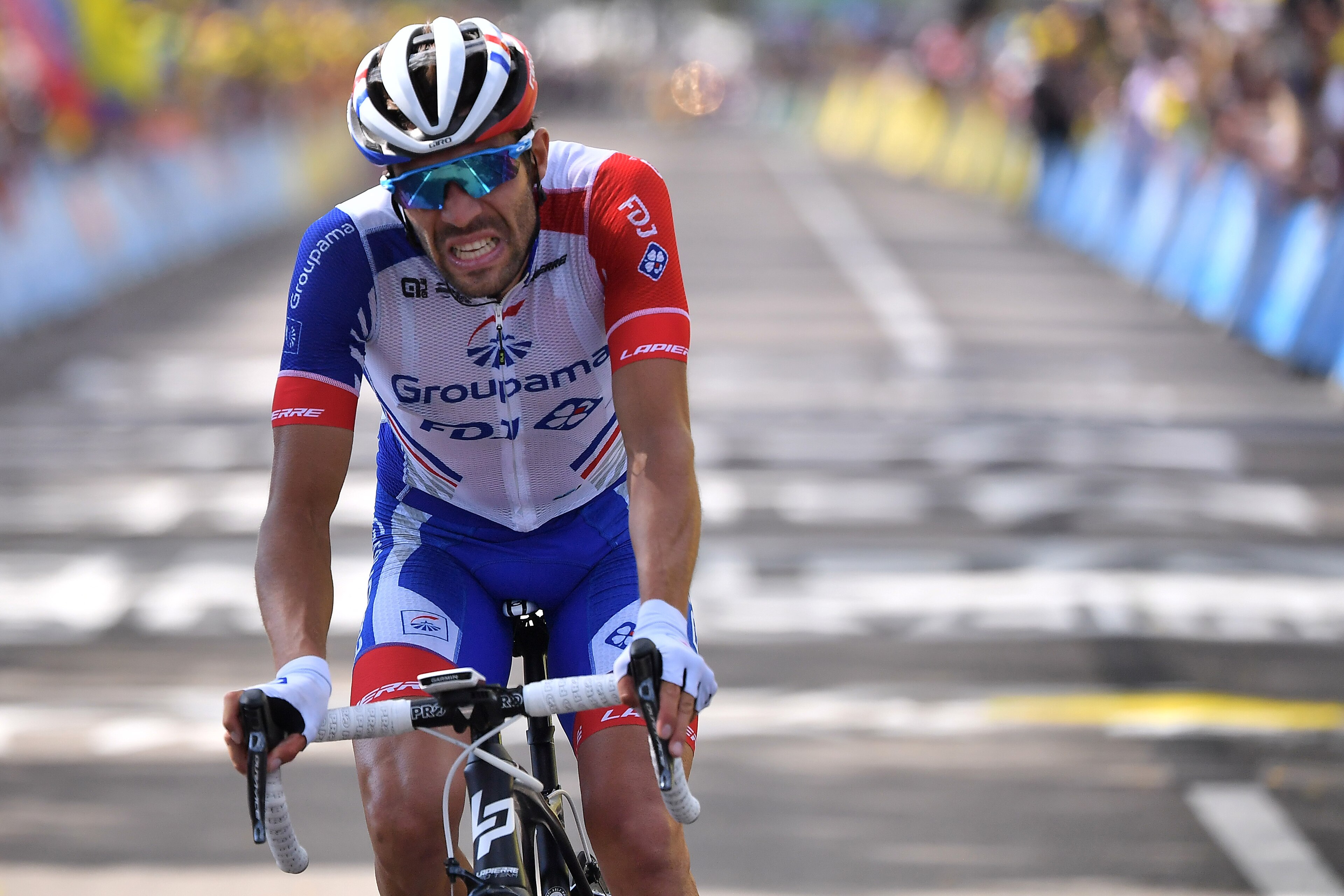 France's Thibaut Pinot reacts on the finish line of the eighth stage of the 106th edition of the Tour de France cycling race between Macon and Saint-Etienne, in Saint-Etienne, eastern France, on July 13, 2019. (Photo by Marco Bertorello / AFP)        (Pho