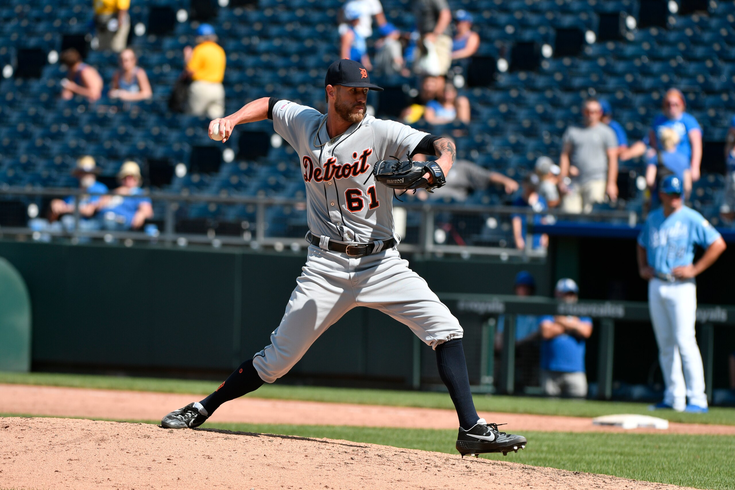 KANSAS CITY, MO - JULY 14: Relief pitcher Shane Greene #61 of the Detroit Tigers throws against the Kansas City Royals at Kauffman Stadium on July 14, 2019 in Kansas City, Missouri. (Photo by Ed Zurga/Getty Images)