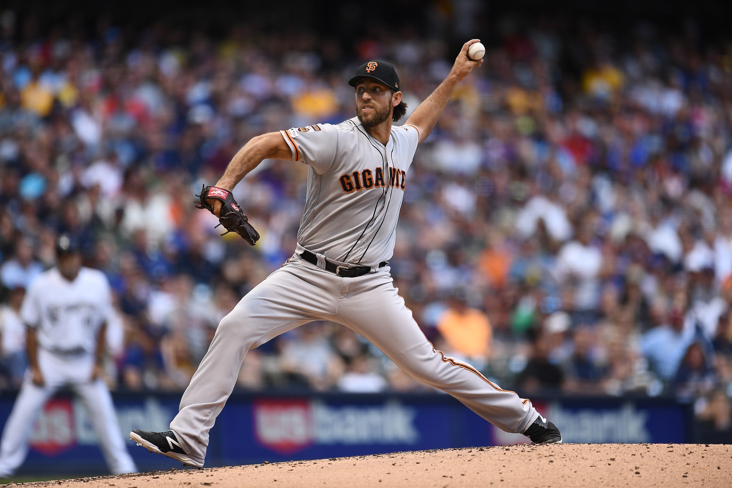 MILWAUKEE, WISCONSIN - JULY 13:  Madison Bumgarner #40 of the San Francisco Giants delivers a pitch during the fourth inning against the Milwaukee Brewers at Miller Park on July 13, 2019 in Milwaukee, Wisconsin. (Photo by Stacy Revere/Getty Images)