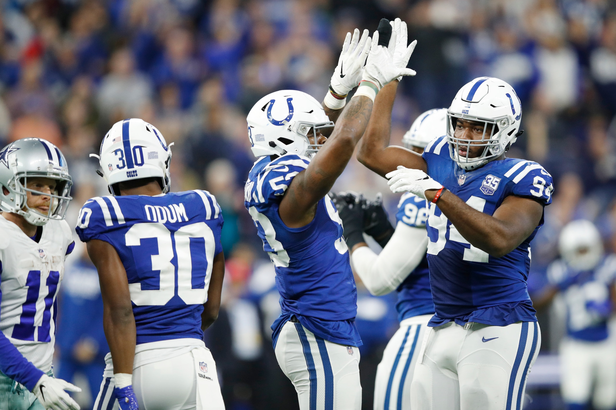 INDIANAPOLIS, IN - DECEMBER 16: Tyquan Lewis #94 and Darius Leonard #53 of the Indianapolis Colts celebrate during the game against the Dallas Cowboys at Lucas Oil Stadium on December 16, 2018 in Indianapolis, Indiana. The Colts won 23-0. (Photo by Joe Ro