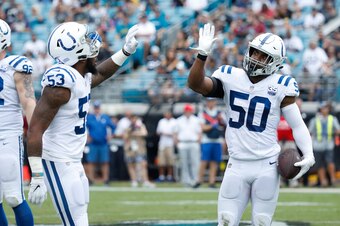 JACKSONVILLE, FL - DECEMBER 02:  Anthony Walker #50 of the Indianapolis Colts celebrates his interception with Darius Leonard #53 in the first half of their game against the Jacksonville Jaguars at  TIAA Bank Field on December 2, 2018 in Jacksonville, Flo