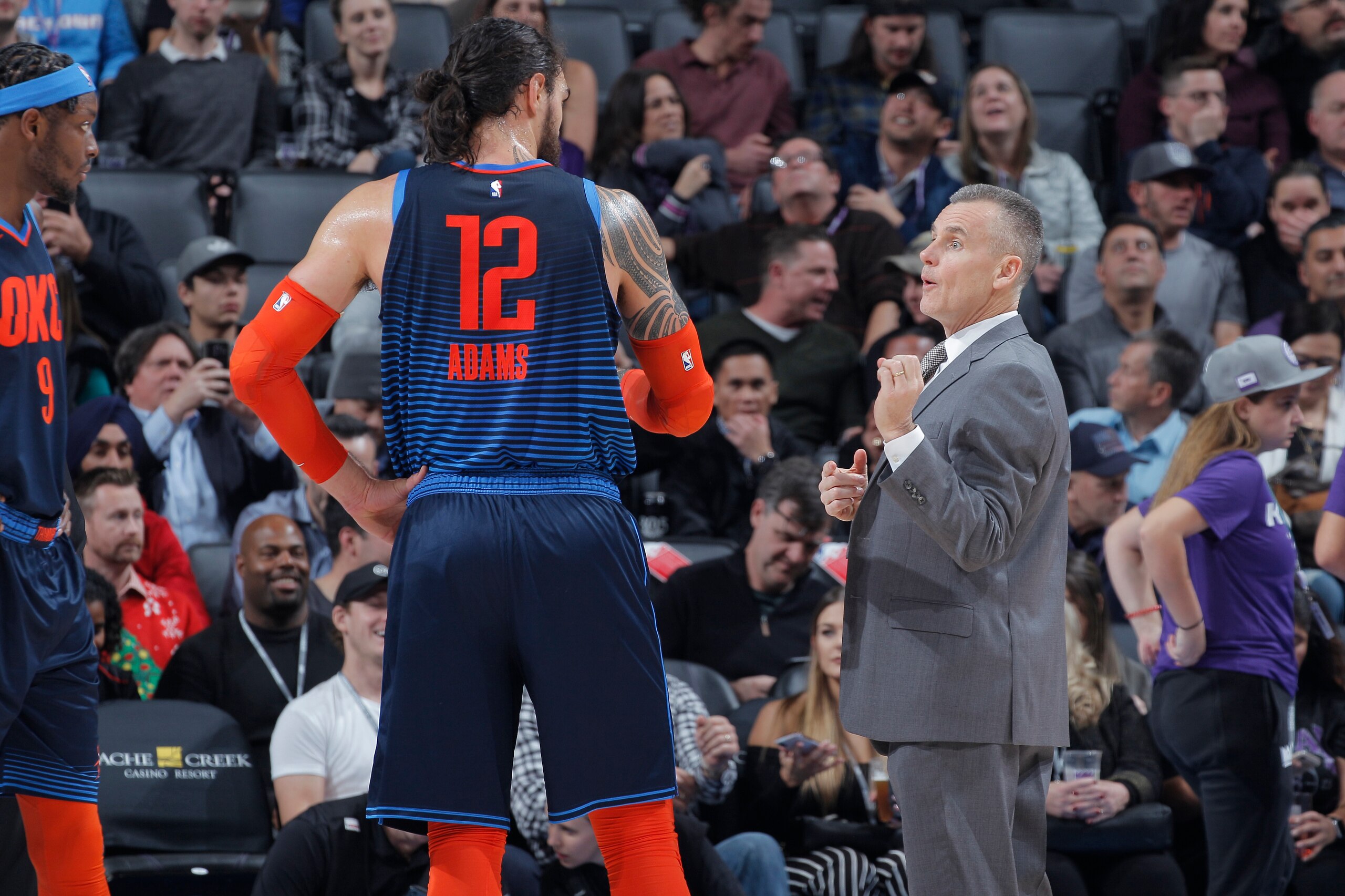 SACRAMENTO, CA - DECEMBER 19: Head Coach Billy Donovan of the Oklahoma City Thunder coaches Steven Adams #12 against the Sacramento Kings on December 19, 2018 at Golden 1 Center in Sacramento, California. NOTE TO USER: User expressly acknowledges and agre
