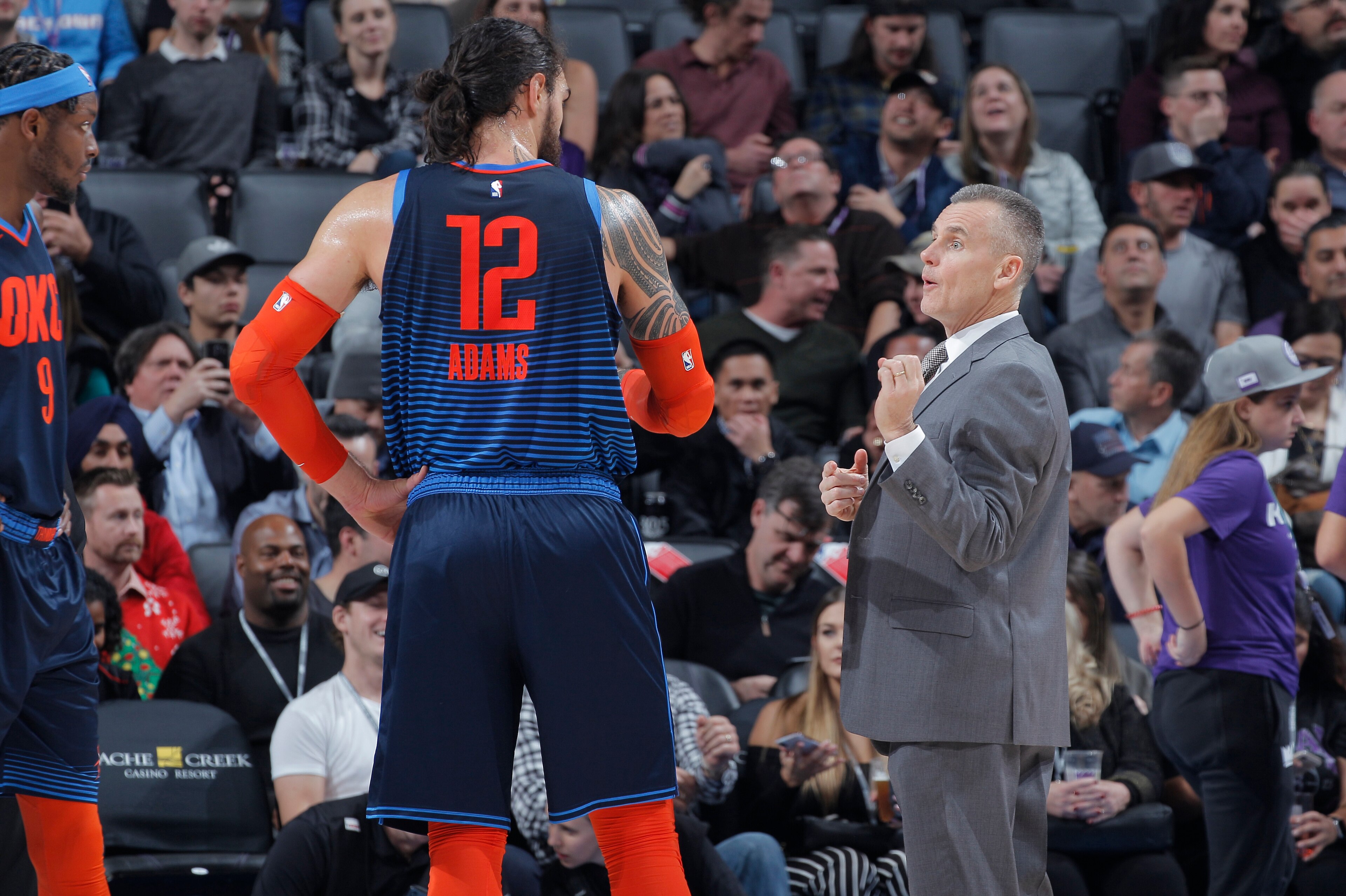SACRAMENTO, CA - DECEMBER 19: Head Coach Billy Donovan of the Oklahoma City Thunder coaches Steven Adams #12 against the Sacramento Kings on December 19, 2018 at Golden 1 Center in Sacramento, California. NOTE TO USER: User expressly acknowledges and agre