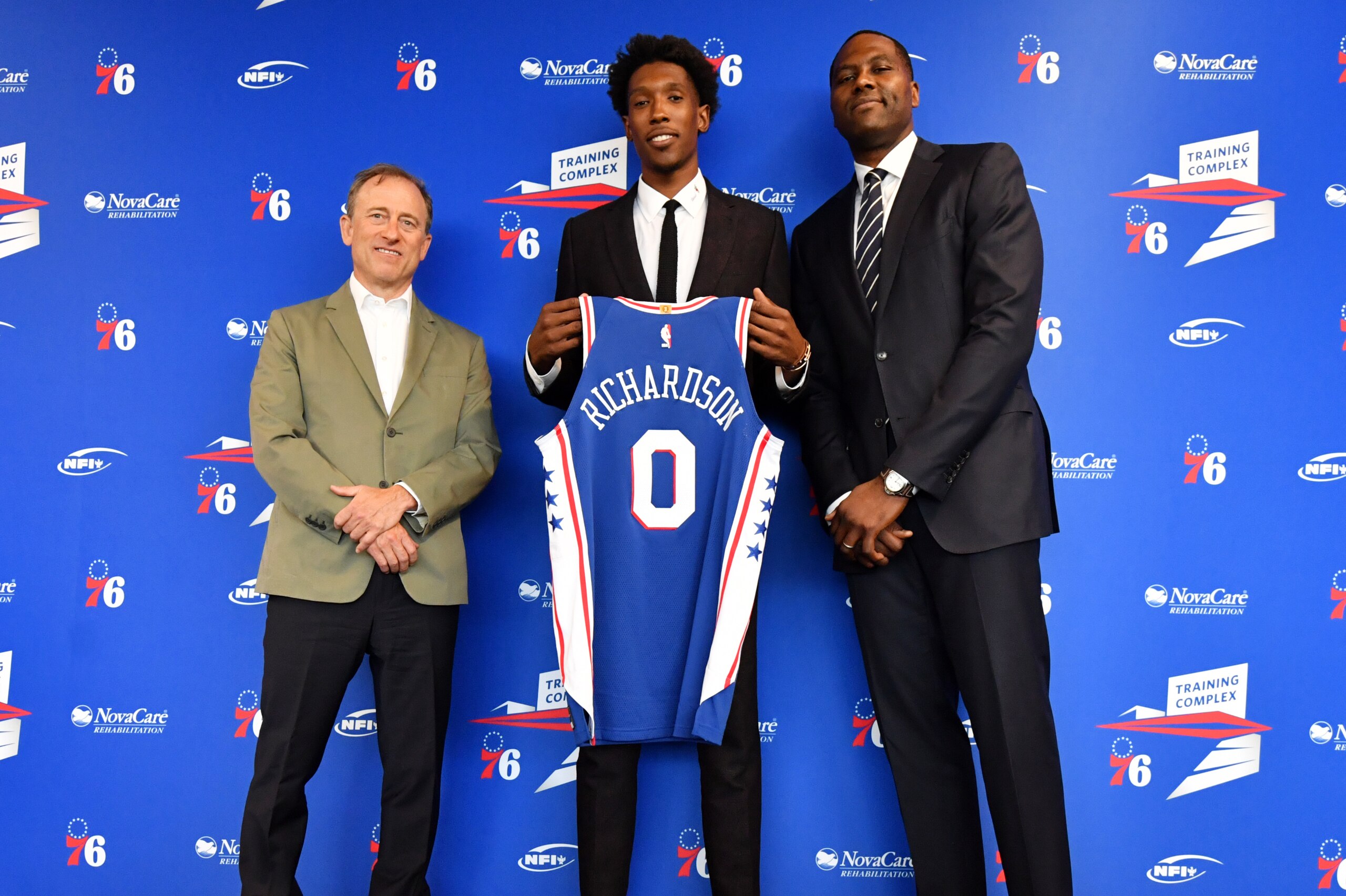 CAMDEN, NJ - JULY 12: Josh Richardson #0 of the Philadelphia 76ers, Josh Harris, and Elton Brand pose for a photo at a press conference on July 12, 2019 at the Philadelphia 76ers Training Complex in Camden, New Jersey. NOTE TO USER: User expressly acknowl
