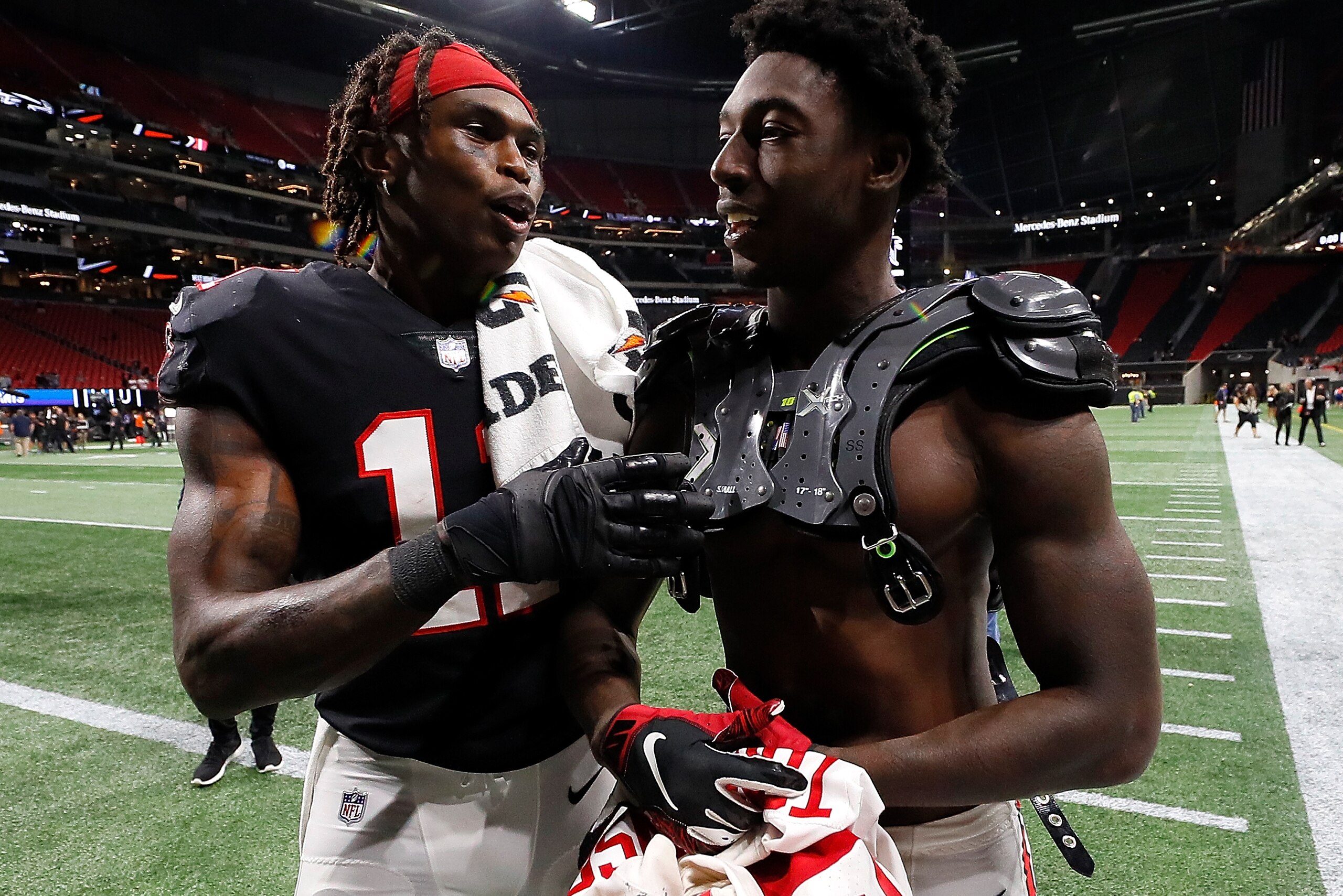ATLANTA, GA - OCTOBER 22:  Julio Jones #11 and Calvin Ridley #18 walk off the field after their 23-20 win over the New York Giants at Mercedes-Benz Stadium on October 22, 2018 in Atlanta, Georgia.  (Photo by Kevin C. Cox/Getty Images)