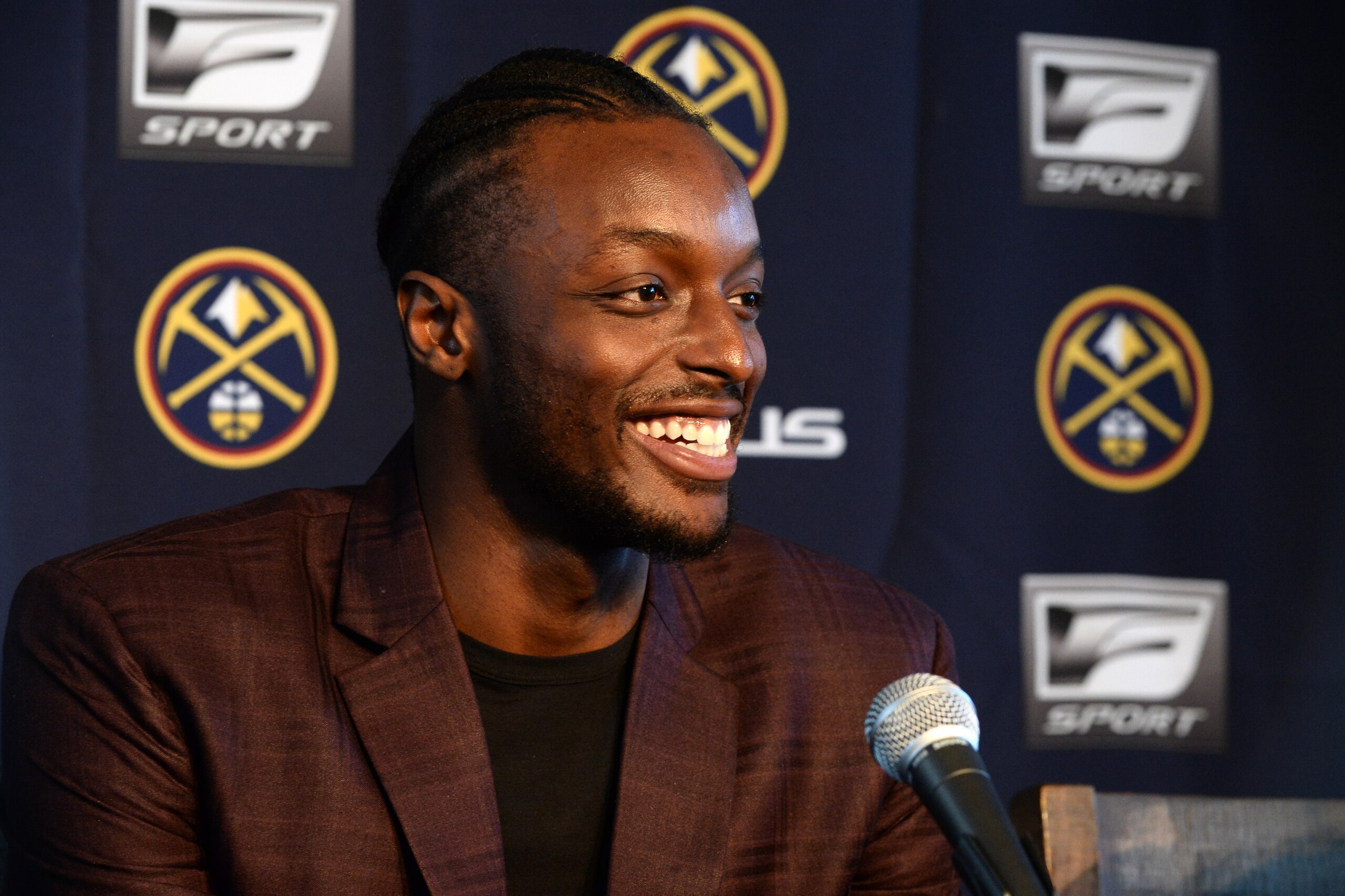 DENVER, CO - JULY 11: Jerami Grant #9 of the Denver Nuggets is introduced during a press conference on July 11, 2019 at the Pepsi Center in Denver, Colorado. NOTE TO USER: User expressly acknowledges and agrees that, by downloading and/or using this photo
