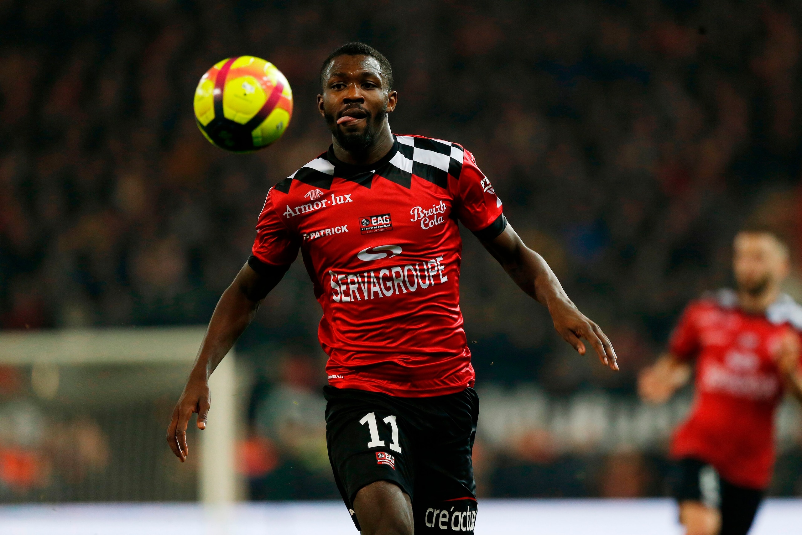 Guingamp's French forward Marcus Thuram runs for the ball during the French L1 football match between Guingamp (EAG) and Angers (SCO) at The Roudourou Stadium in Guingamp, north-western France on February 23, 2019. (Photo by CHARLY TRIBALLEAU / AFP)      