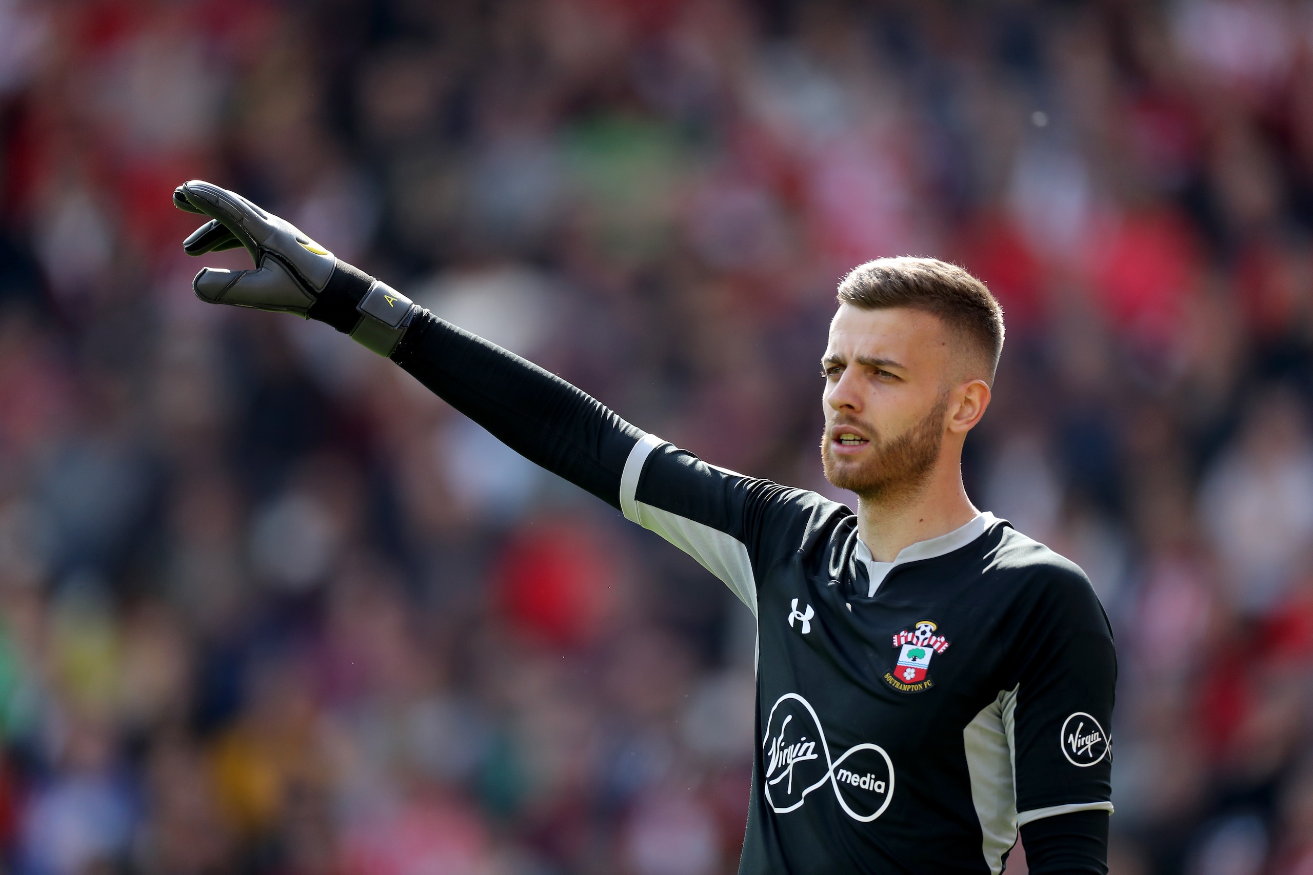 SOUTHAMPTON, ENGLAND - MAY 12: Angus Gunn of Southampton in action during the Premier League match between Southampton FC and Huddersfield Town at St Mary's Stadium on May 12, 2019 in Southampton, United Kingdom. (Photo by David Cannon/Getty Images)