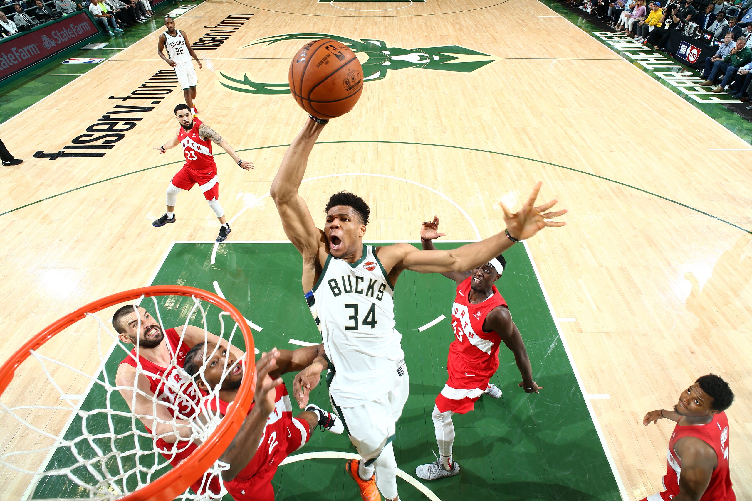 MILWAUKEE, WI - MAY 23: Giannis Antetokounmpo #34 of the Milwaukee Bucks dunks the ball against the Toronto Raptors during Game Five of the Eastern Conference Finals of the 2019 NBA Playoffs on May 23, 2019 at the Fiserv Forum Center in Milwaukee, Wiscons