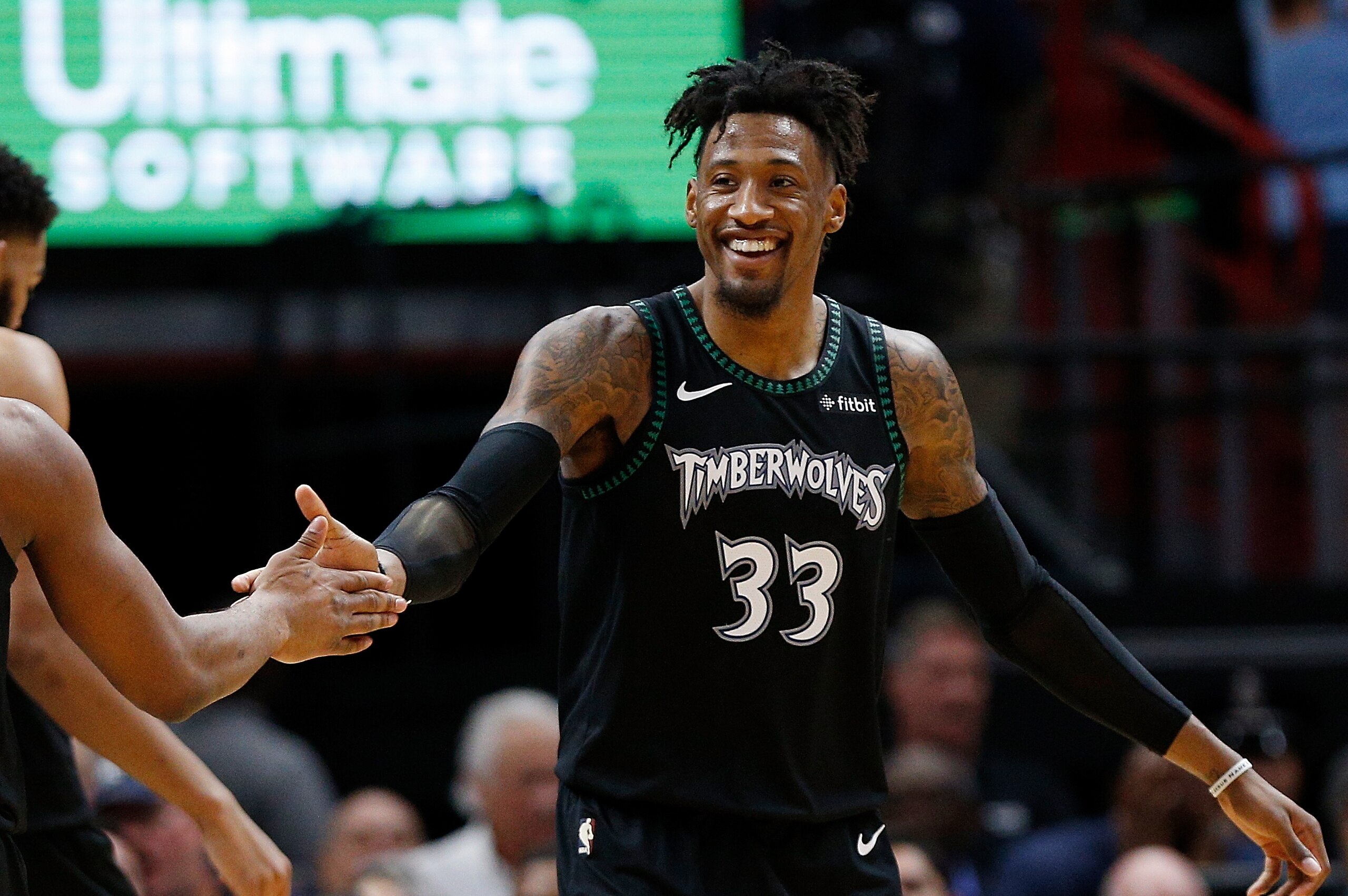 MIAMI, FL - DECEMBER 30:  Robert Covington #33 of the Minnesota Timberwolves celebrates with Josh Okogie #20 against the Miami Heat at American Airlines Arena on December 30, 2018 in Miami, Florida. NOTE TO USER: User expressly acknowledges and agrees tha