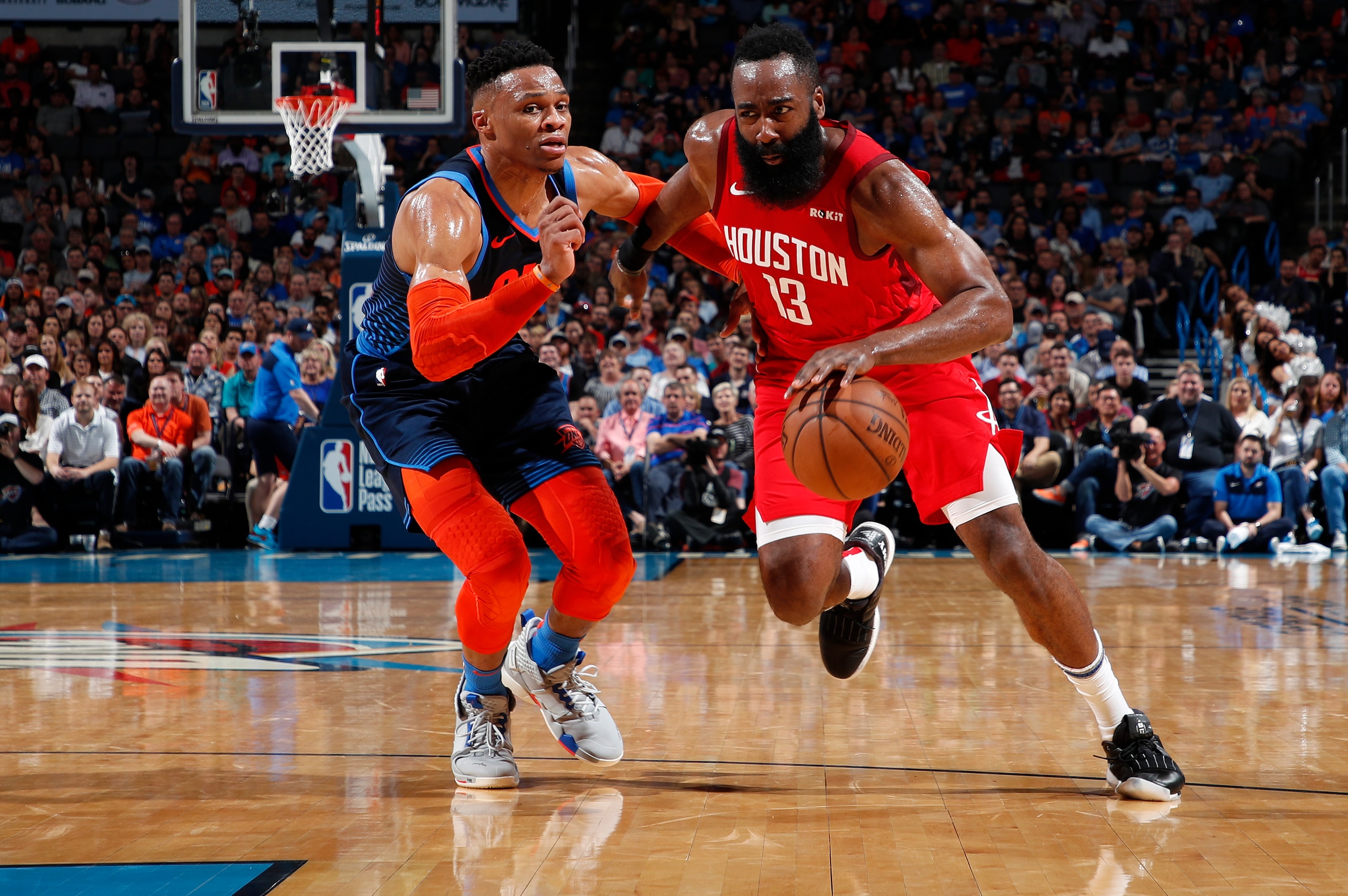 OKLAHOMA CITY, OK - APRIL 9: James Harden #13 of the Houston Rockets drives past Russell Westbrook #0 of the Oklahoma City Thunder on April 9, 2019 at Chesapeake Energy Arena in Oklahoma City, OK. NOTE TO USER: User expressly acknowledges and agrees that, OKLAHOMA CITY, OK - APRIL 9: James Harden #13 of the Houston Rockets drives past Russell Westbrook #0 of the Oklahoma City Thunder on April 9, 2019 at Chesapeake Energy Arena in Oklahoma City, OK. NOTE TO USER: User expressly acknowledges and agrees that,