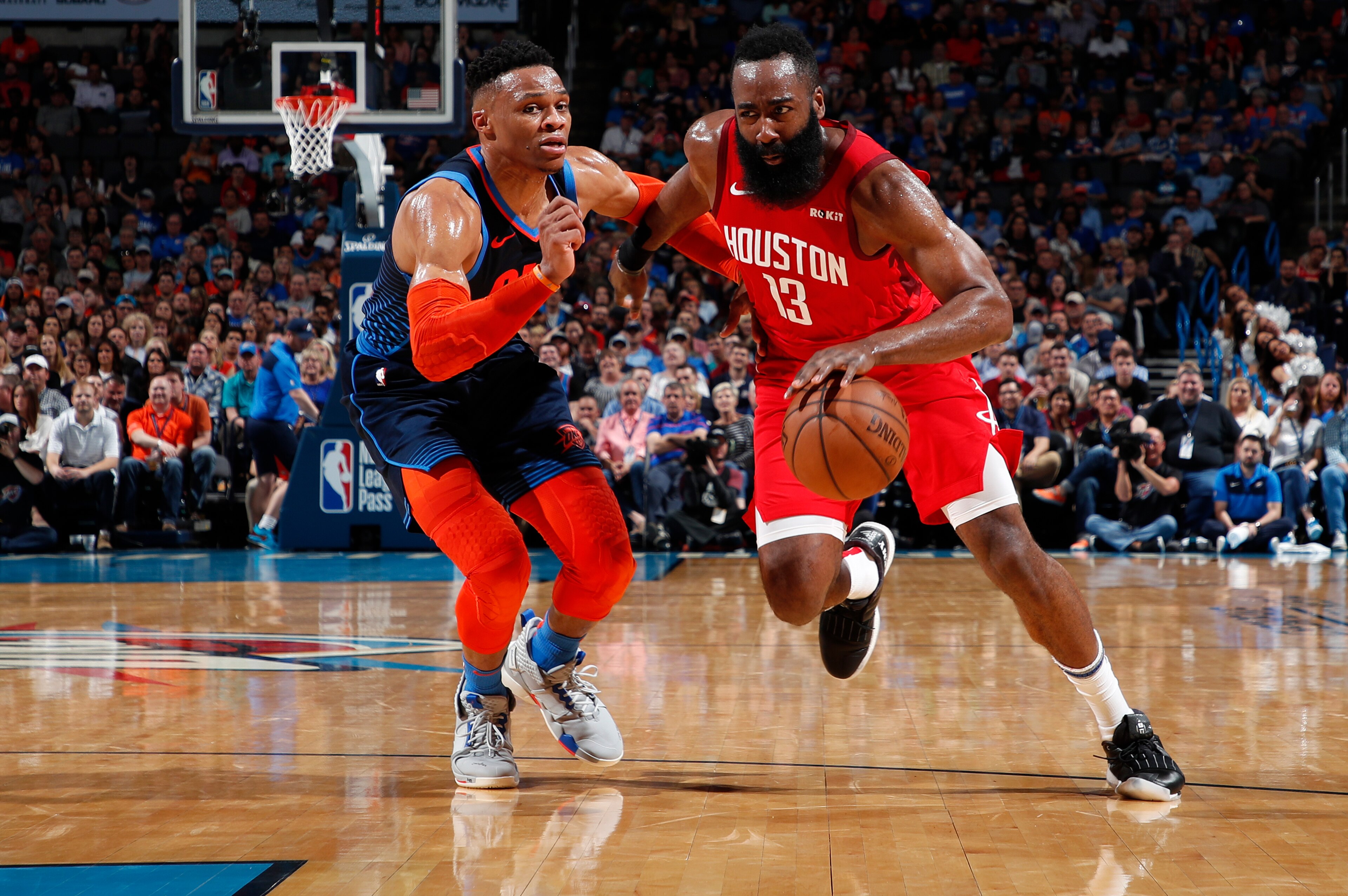 OKLAHOMA CITY, OK - APRIL 9: James Harden #13 of the Houston Rockets drives past Russell Westbrook #0 of the Oklahoma City Thunder on April 9, 2019 at Chesapeake Energy Arena in Oklahoma City, OK. NOTE TO USER: User expressly acknowledges and agrees that, OKLAHOMA CITY, OK - APRIL 9: James Harden #13 of the Houston Rockets drives past Russell Westbrook #0 of the Oklahoma City Thunder on April 9, 2019 at Chesapeake Energy Arena in Oklahoma City, OK. NOTE TO USER: User expressly acknowledges and agrees that,